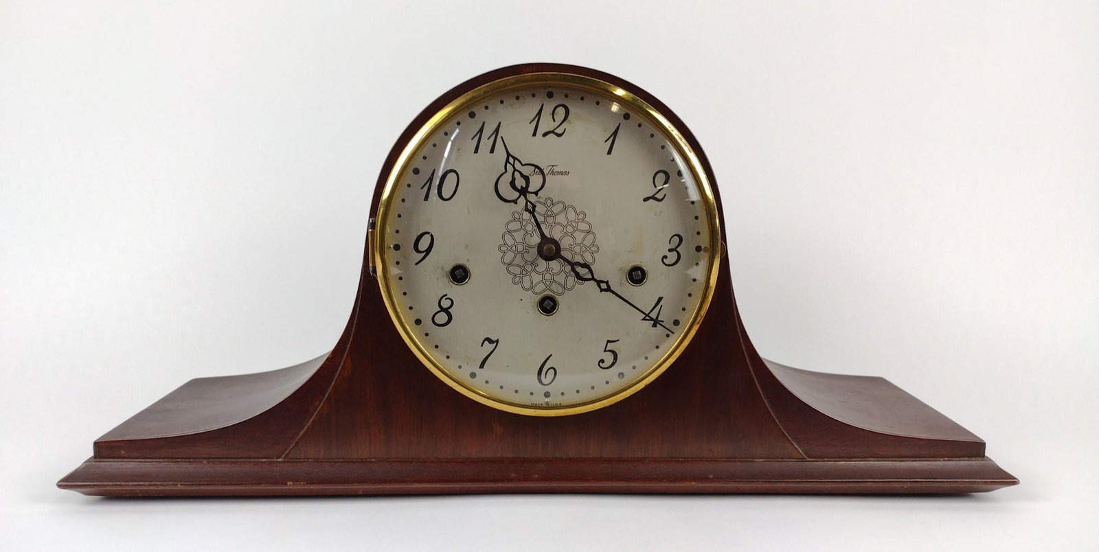 Seth Thomas Mantel Clock: Starts and stops. 20" wide X 6" deep X 9" high. DM IMPORTANT: Before bidding, please read the terms and conditions. When you registered for the auction you agreed to these terms and will be required t