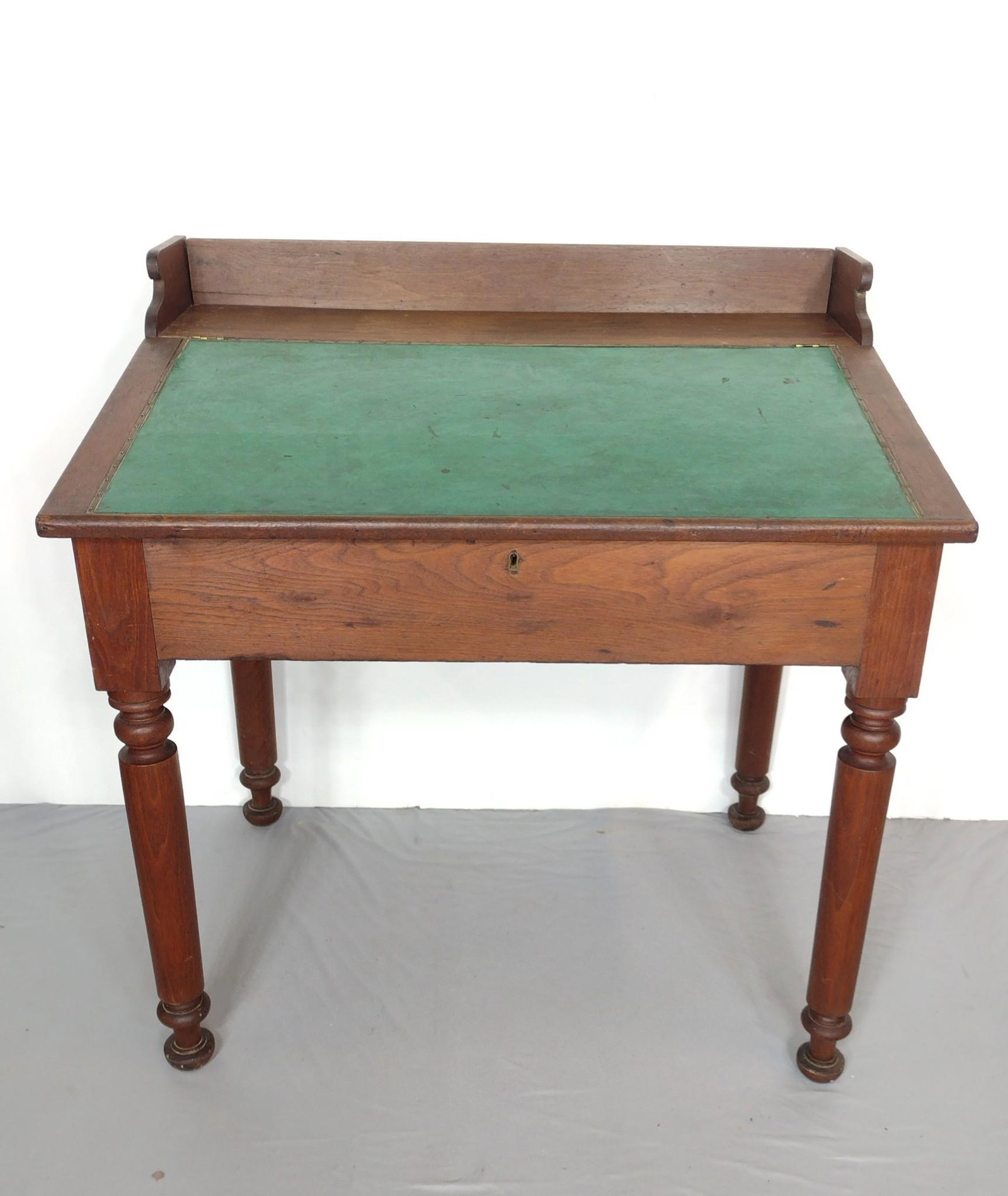 Antique Cherry Desk: 37-1/4" wide X 27" deep X 37-1/4" high. Has some light scratches and areas of discoloring. MG. IMPORTANT: Before bidding, please read the terms and conditions. When you registered for the auction you 