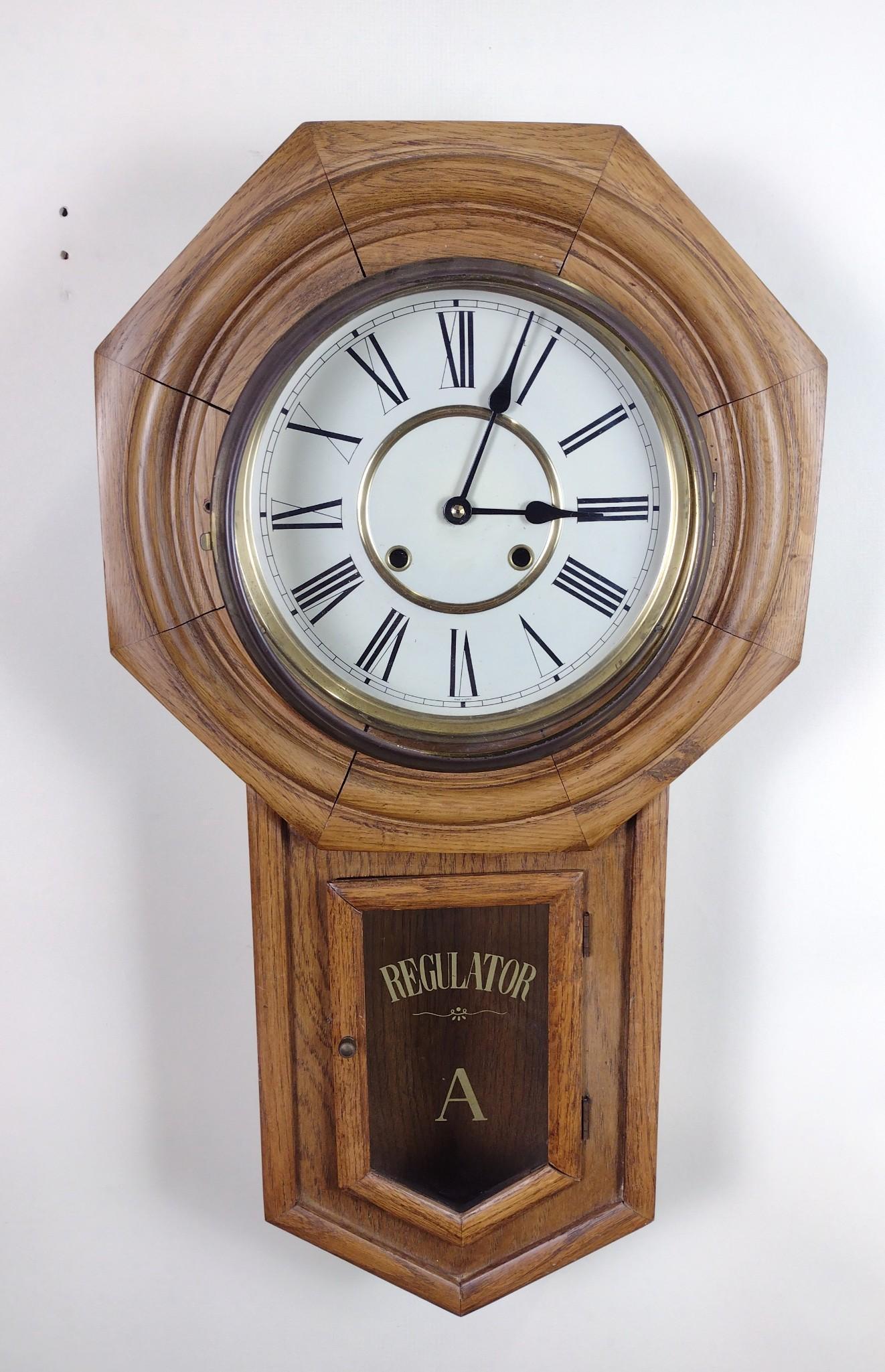 Regulator Wall Clock: Working. 16" wide X 28-1/2" high. DM IMPORTANT: Before bidding, please read the terms and conditions. When you registered for the auction you agreed to these terms and will be required to comply with 