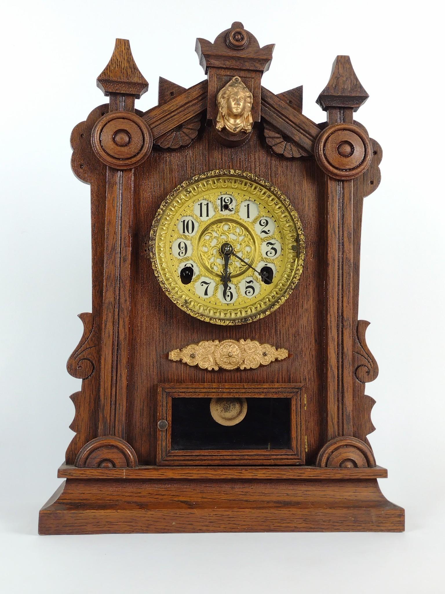 Mantel Clock: Starts and stops. 13-3/4" wide X 6" deep X 19" high. DM IMPORTANT: Before bidding, please read the terms and conditions. When you registered for the auction you agreed to these terms and will be requi