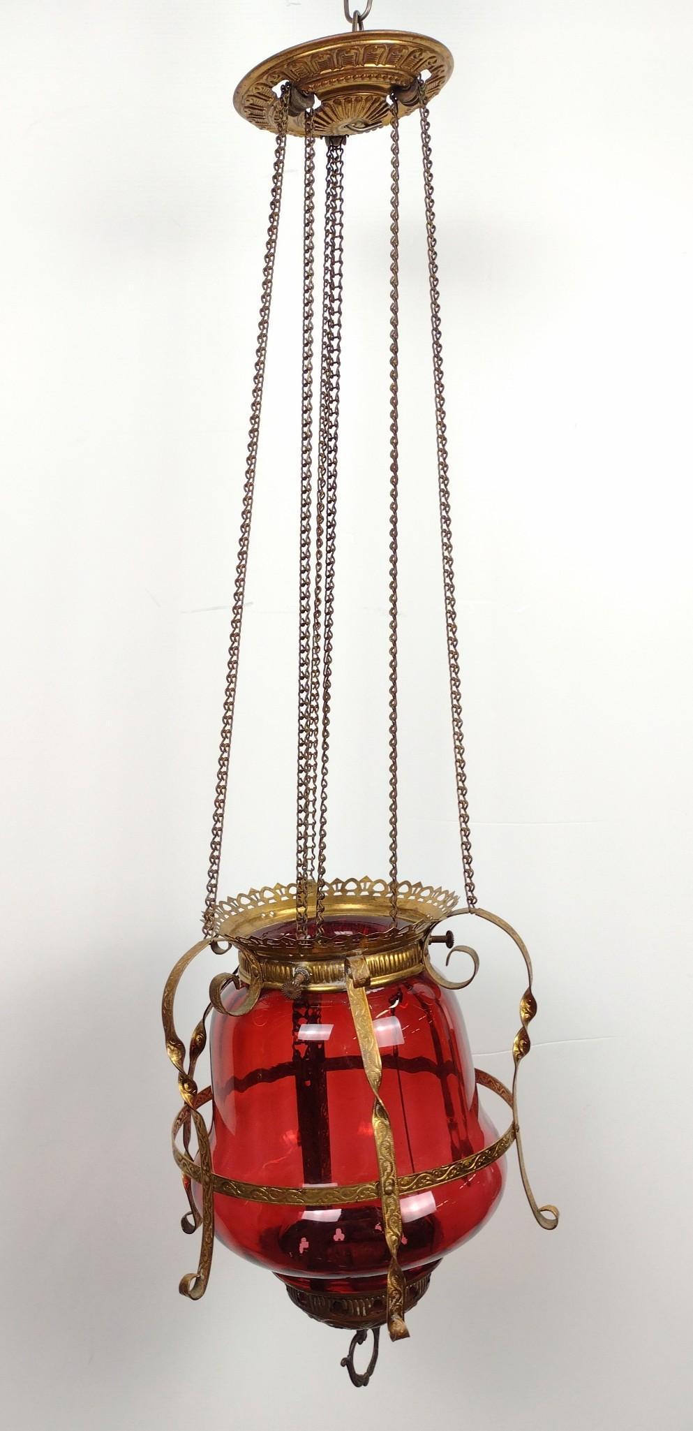 Cranberry Glass Hanging Light: 8" wide X 12" (without chains) to 28" high (including chains). DM IMPORTANT: Before bidding, please read the terms and conditions. When you registered for the auction you agreed to these terms and wil