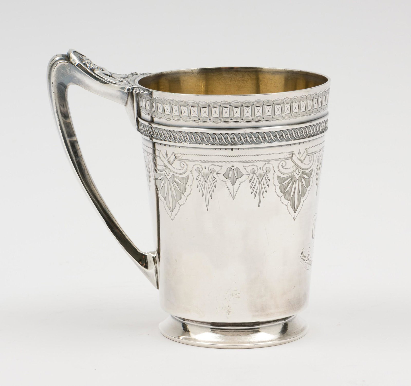 Gorham Christening Cup, San Francisco 1871: DESCRIPTION: Gorham Christening Cup, 1871. Retailed by J.W. Tucker & Co. of San Francisco, California. Inscribed San Francisco, April 7th. 1871 with monogram above. Gold washed interior. Floral design