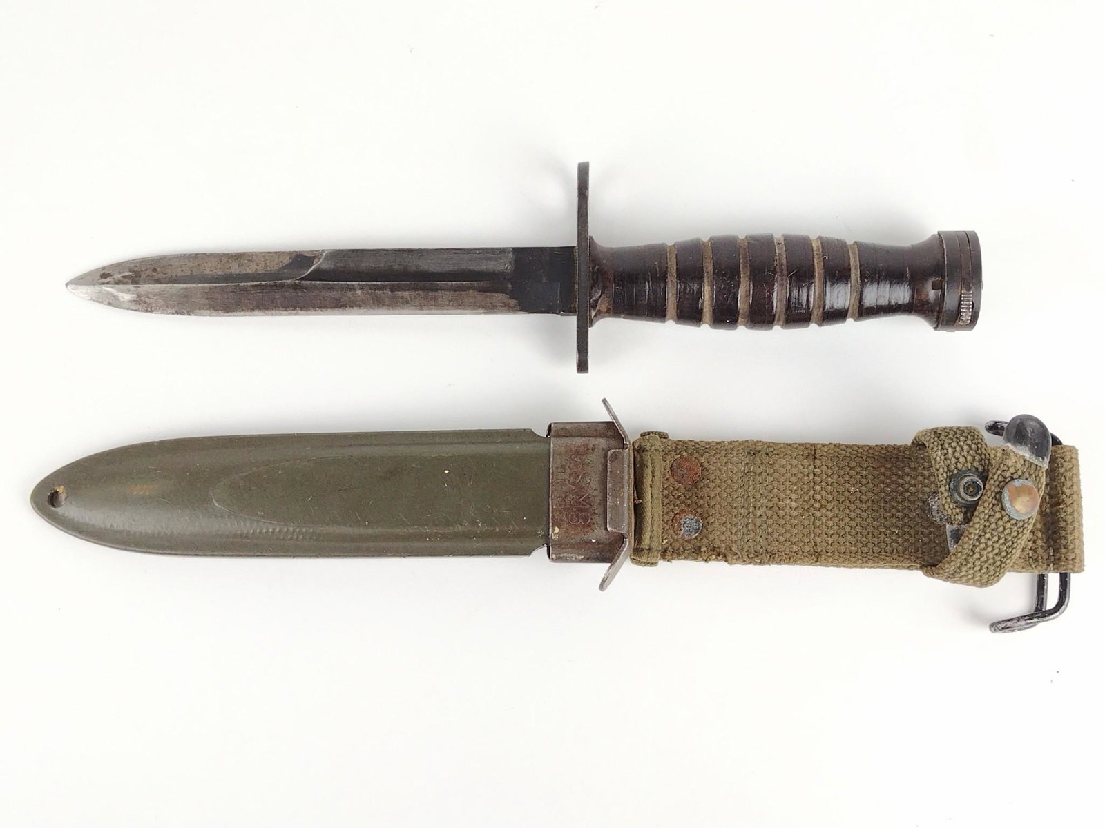 US M8 Bayonet: With sheath. Overall 12-3/4" long. Blade 6-1/2" long. DP. IMPORTANT: Before bidding, please read the terms and conditions. When you registered for the auction you agreed to these terms and will be req