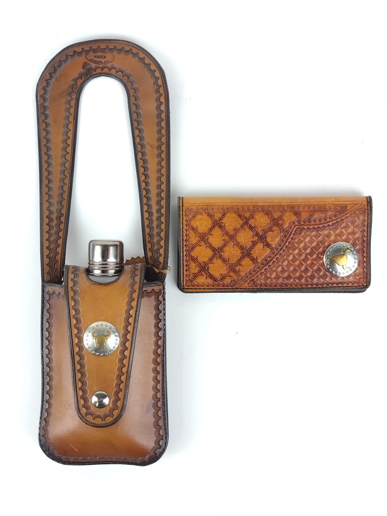 Max Anderson Flask Case & Kelly Silvertip Wallet: Leather flask case with metal decoration. 15-1/2" high x 5-1/4" wide. Leather wallet with metal decoration 7" high x 3-1/2" wide. Both hand tooled. DP. IMPORTANT: Before bidding, please read the terms