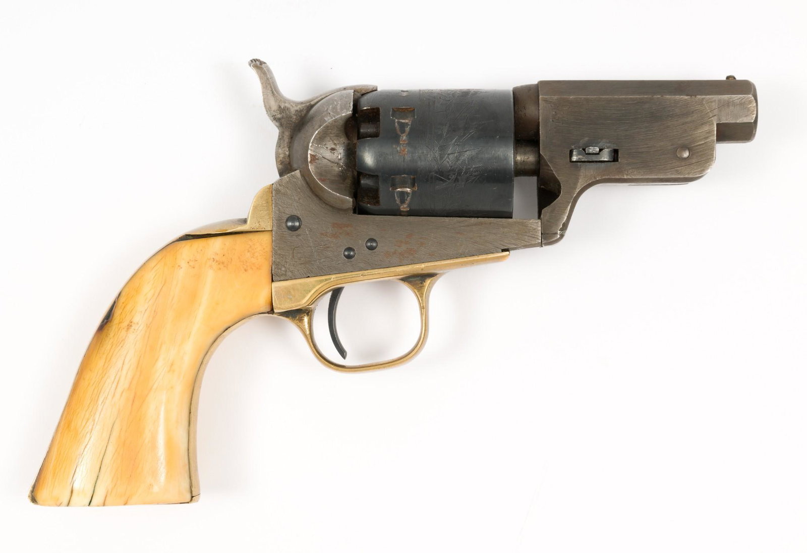 Composite Percussion Revolver: Serial Number: 6649 Design: Cap-and-ball revolver that appears to have been assembled with parts from various sources. Barrel assembly is 2-3/4" long, in the white, with no charger and no serial or as