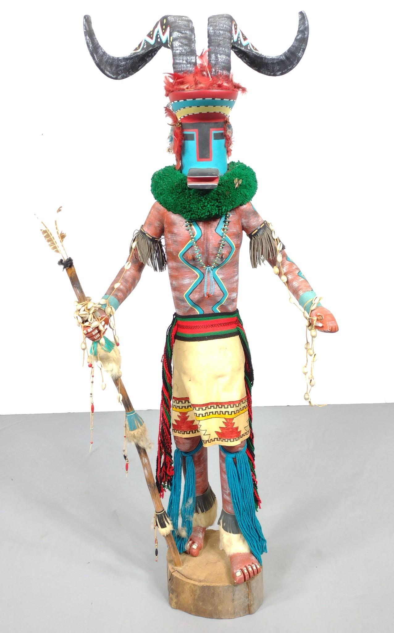 51" Yunt Mountain Sheep Katsina: Katsina or Kachina. 20-1/4" wide X 12" deep X 51" high. Signed under base. MG. IMPORTANT: Before bidding, please read the terms and conditions. When you registered for the auction you agreed to these 