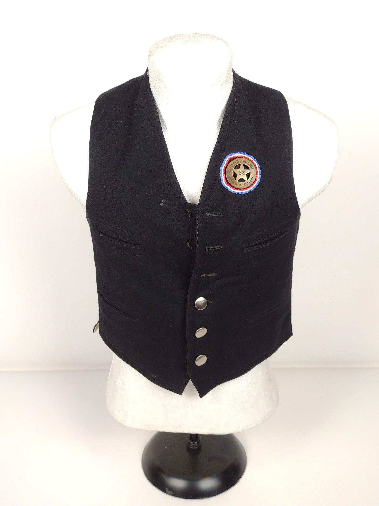 Gentleman's Vest With Apache Police Badge: Has three missing buttons. 11" wide X 19" long. MG. IMPORTANT: Before bidding, please read the terms and conditions. When you registered for the auction you agreed to these terms and will be required 