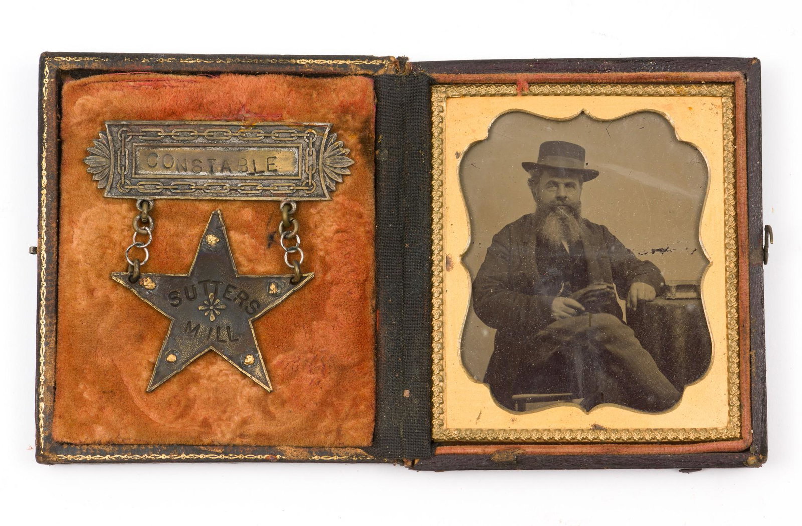 2 Cased Badges & Photographs: Includes Sutter's Mill Constable badge with associated cased photograph 6-1/2" wide when open x 3-3/4" high.Also includes City Marshal Colorado Springs badge with associated cased photograph 6-1/2" wi