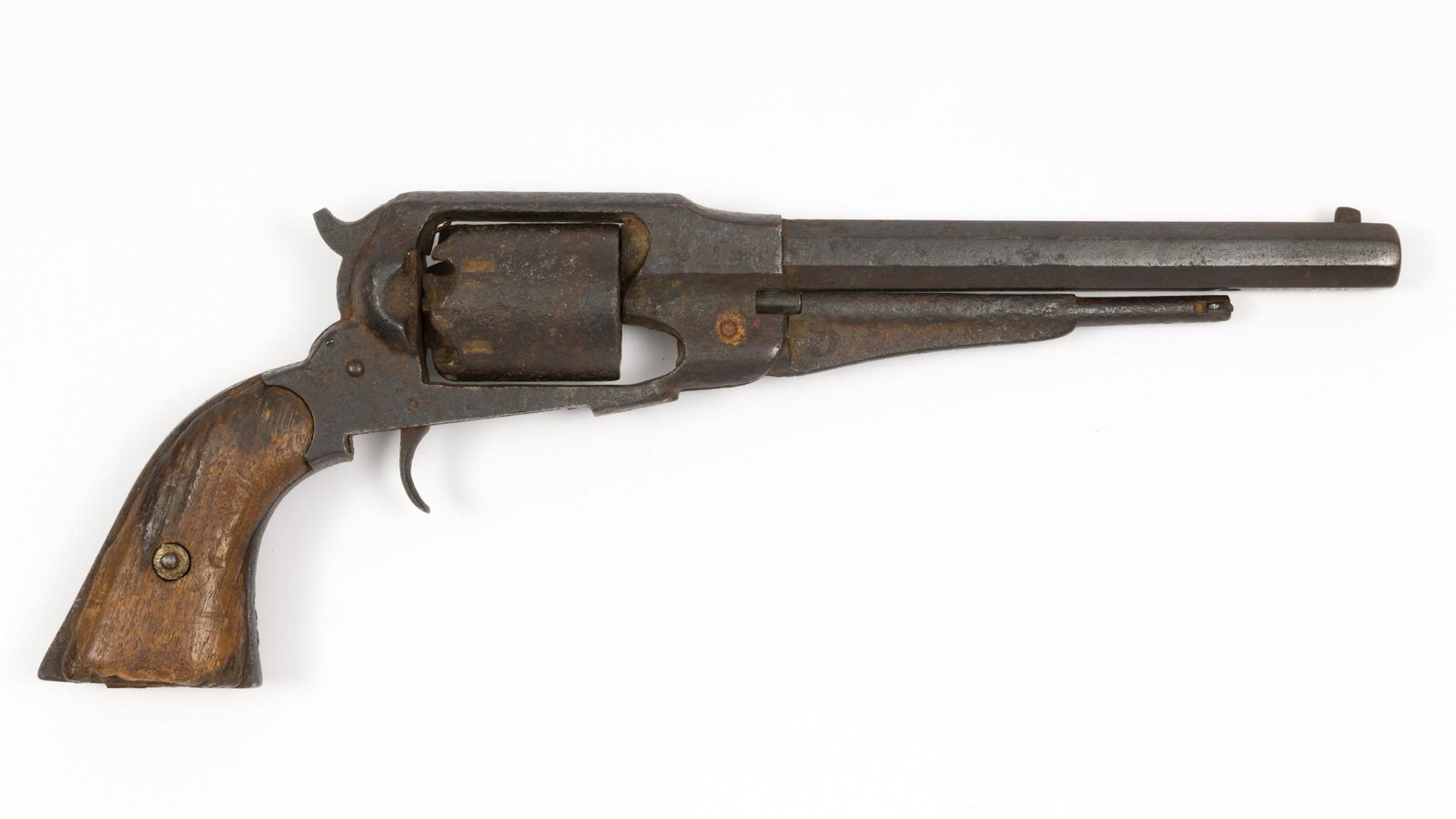 Relic Condition Remington Percussion Revolver, Cal. .44: Serial Number: NSN Design: Relic condition Remington percussion revolver caliber .44. This piece rates as a "dug-up" and is intended for display only. 8" octagonal barrel. Rear of cylinder has been bo