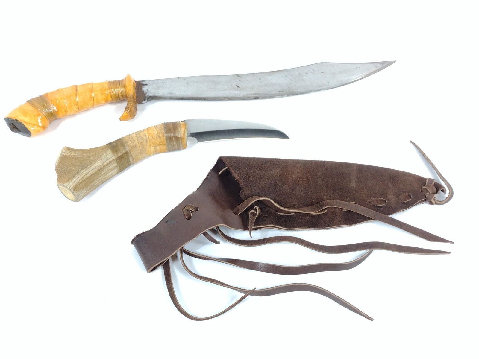 Vintage Machete & Sheath Knife: Blades 11-3/4" - 22" long. No markings found. MG. SR-126. IMPORTANT: Before bidding, please read the terms and conditions. When you registered for the auction you agreed to these terms and will be req