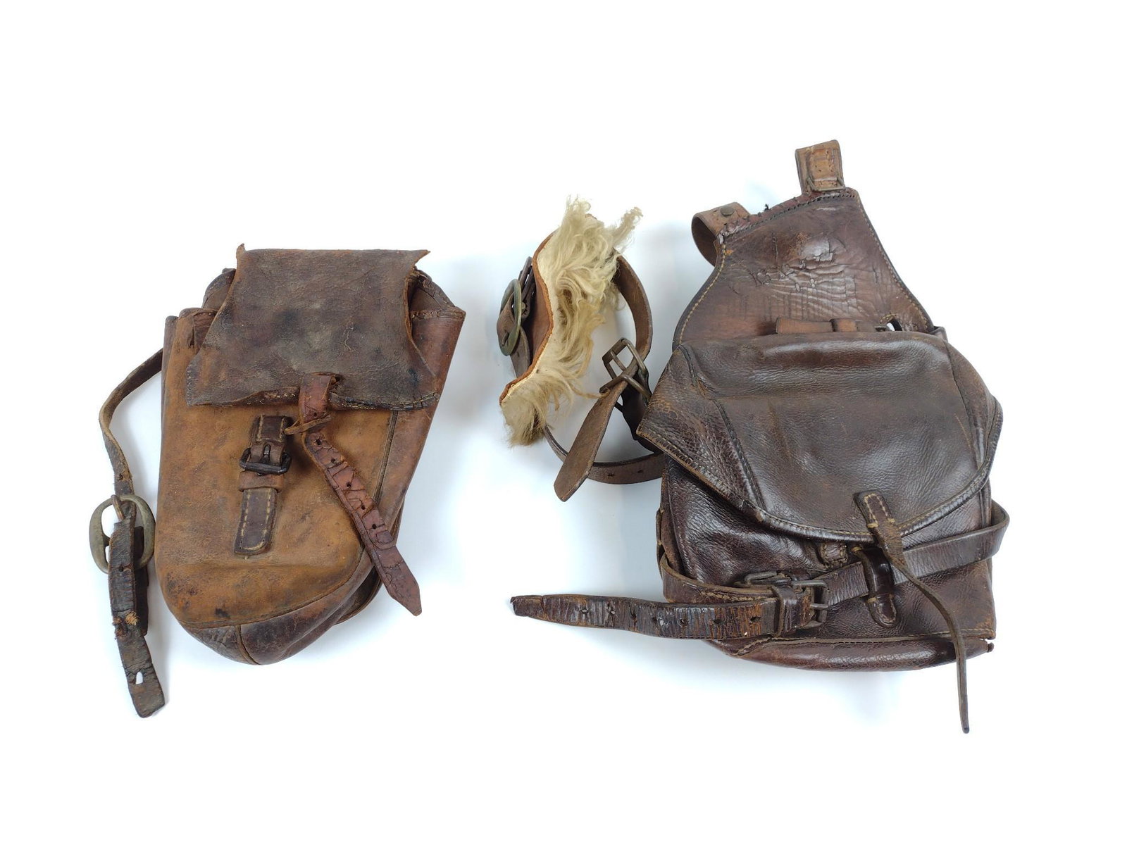 2 Leather Ranch Bags: One with fance repair tool. 12-1/2 to 13-1/2" high. Both have wear. MG. IMPORTANT: Before bidding, please read the terms and conditions. When you registered for the auction you agreed to these terms a