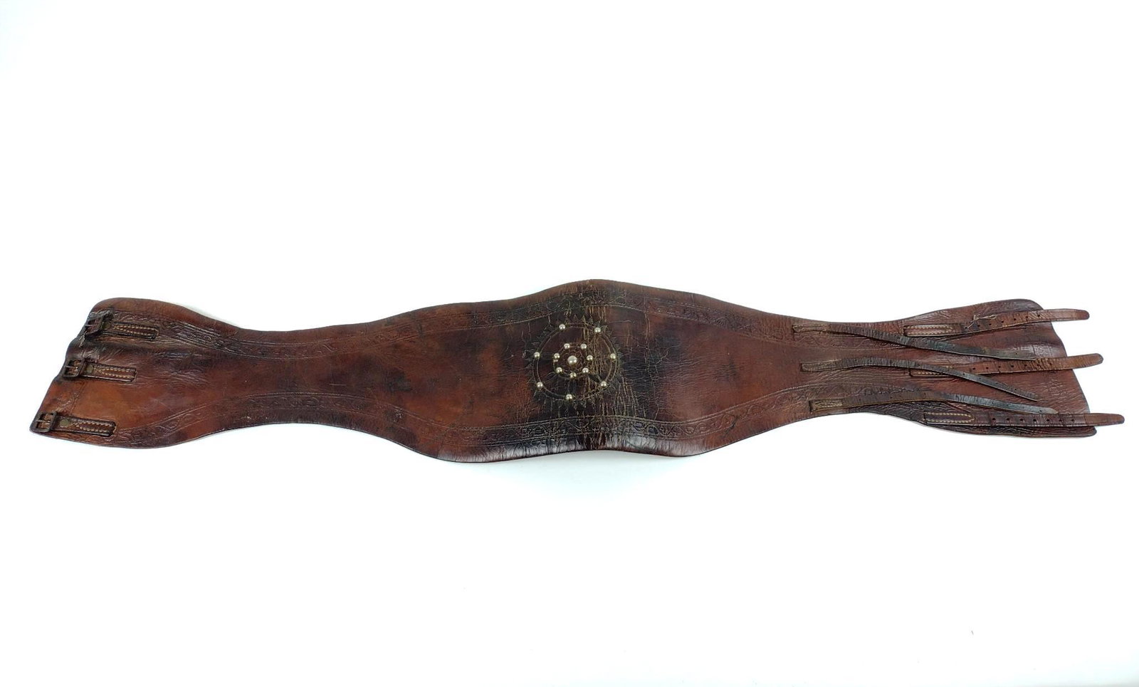 Antique Hand Tooled Leather Belt: 37" wide. MG. IMPORTANT: Before bidding, please read the terms and conditions. When you registered for the auction you agreed to these terms and will be required to comply with them.