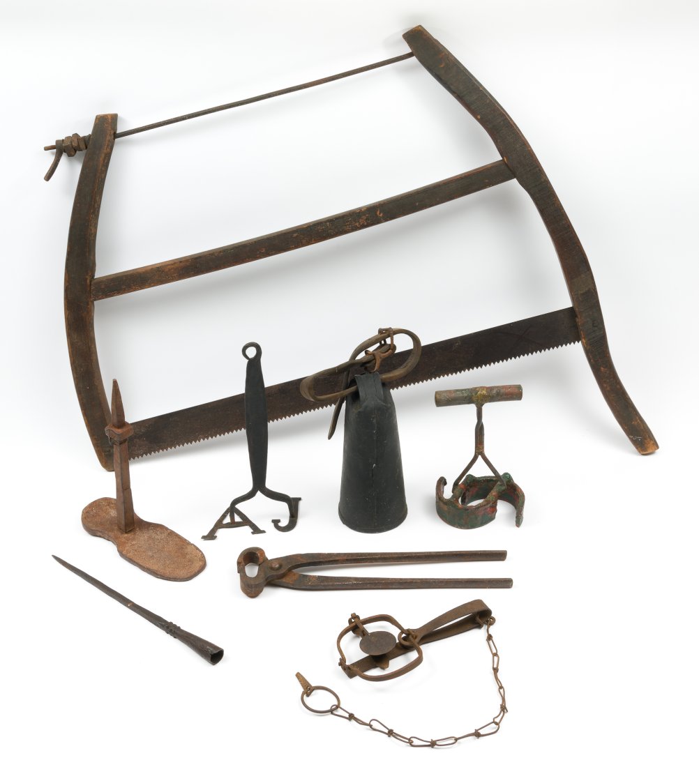 8 Ranch Items Incl Bell: Includes saw, bell on leather strap, two branding irons, a snap trap, hoof nippers, stakes. RM IMPORTANT: Before bidding, please read the terms and conditions. When you registered for the auction you 