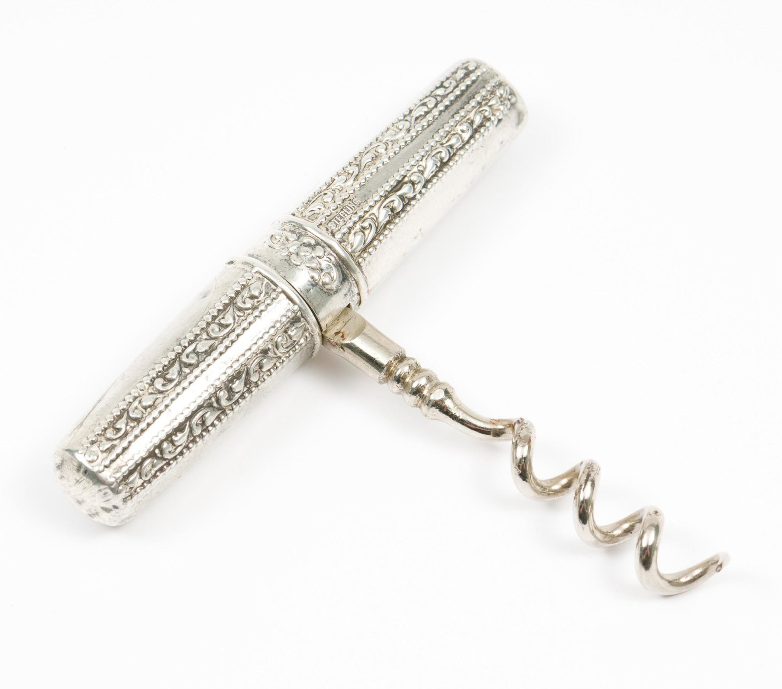 Sterling Folding Corkscrew: Marked sterling. No hallmark. 3" long. 1.0 troy ounces including corkscrew. KE. IMPORTANT: Before bidding, please read the terms and conditions. When you registered for the auction you agreed to these