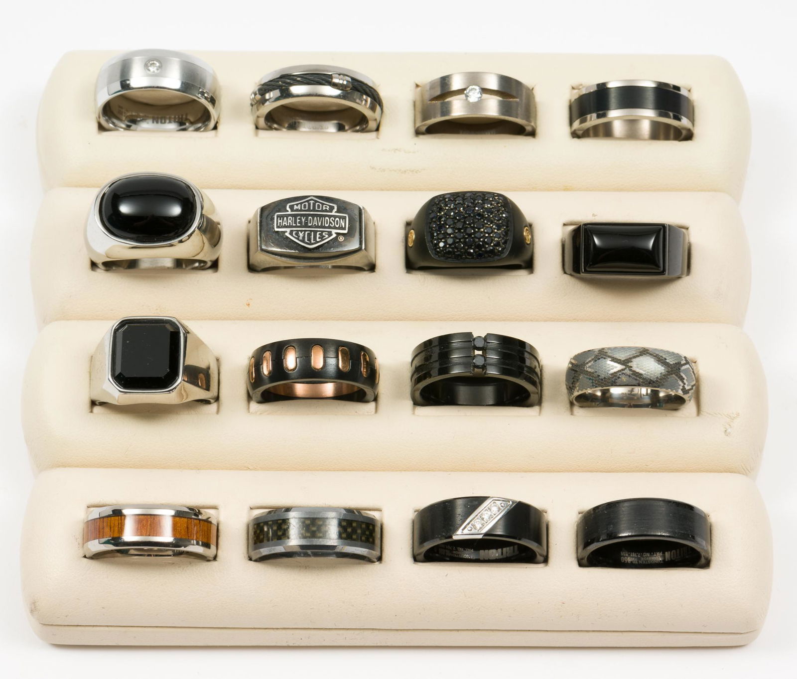 16 Men's Rings: Includes 18K/925, Stainless Steel, and Titanium. Sizes 10-11. LM IMPORTANT: Before bidding, please read the terms and conditions. When you registered for the auction you agreed to these terms and will