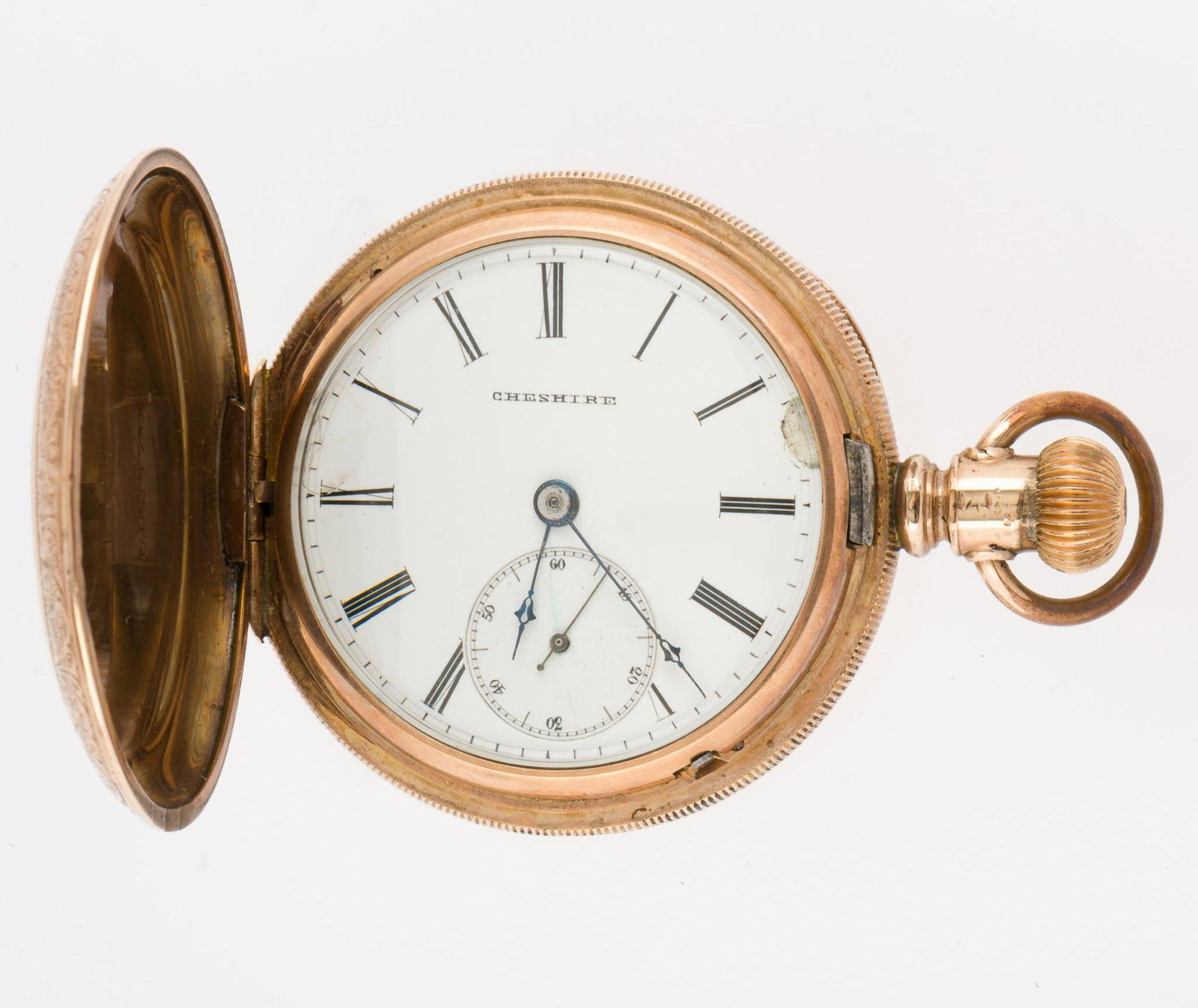 Cheshire Hunter Case Pocket Watch: Size 21, dial marked Cheshire with sunk second hand, Roman numerals. Small discoloration to dial edge, slight repair nick on dial at 2:30. Eureka case marked 502476, stem wind, lever set. Movement mar