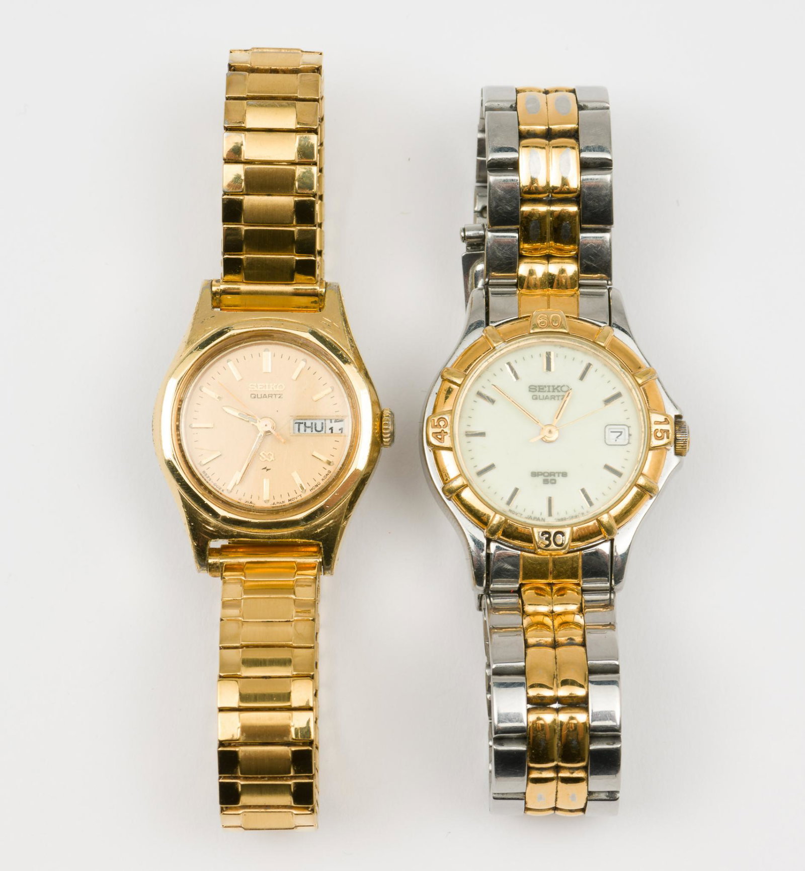 2 Ladies Seiko Wristwatches: Includes one two-tone quartz watch and one gold toned watch. 2" interior diameter. 1-1/4" lug to lug. Both run. KE. IMPORTANT: Before bidding, please read the terms and conditions. When you registered