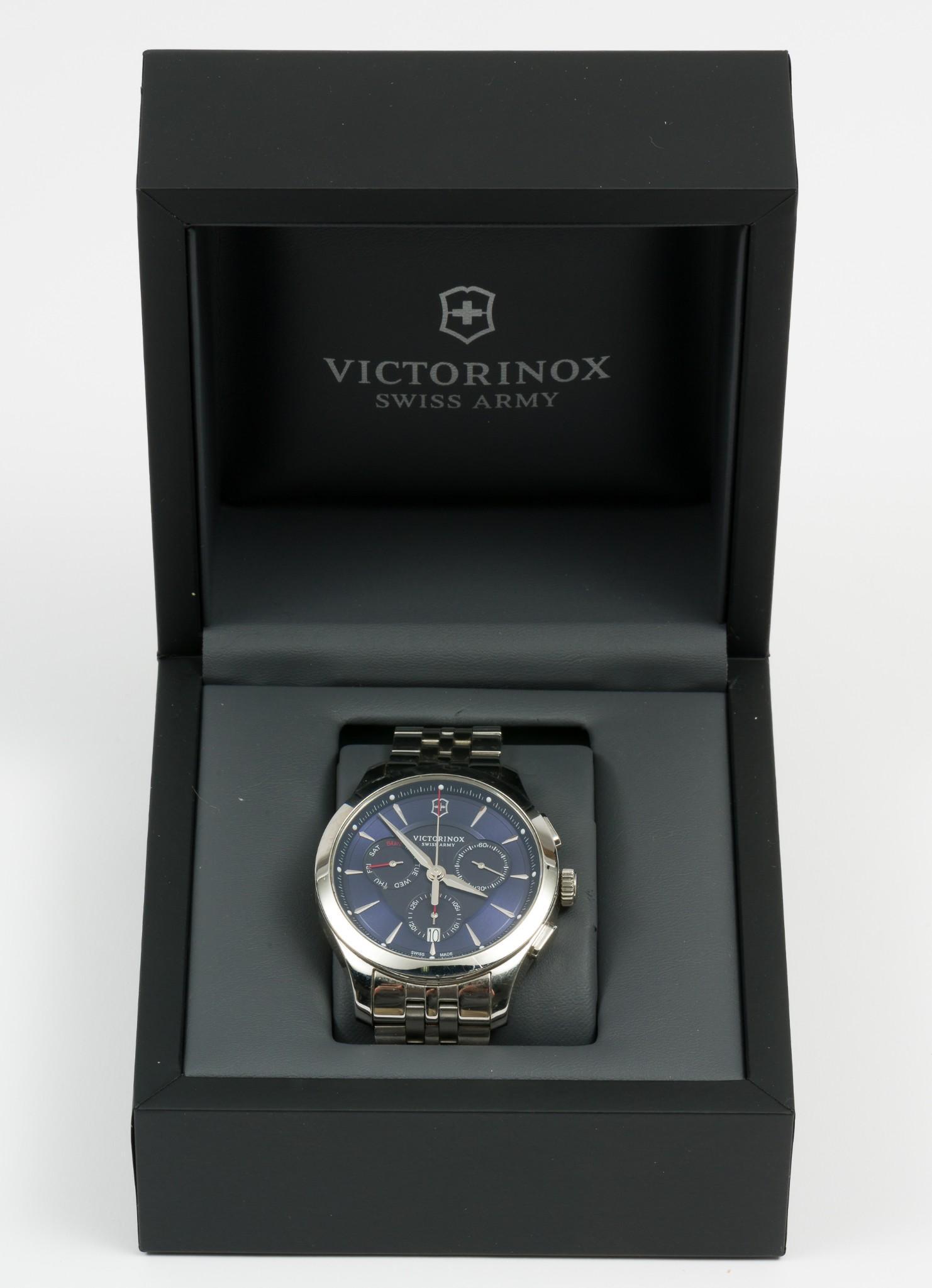 Victorinox Swiss Army Chronograph Wristwatch: Model 241746, blue dial, Case length 2", lug to lug. LM IMPORTANT: Before bidding, please read the terms and conditions. When you registered for the auction you agreed to these terms and will be requi