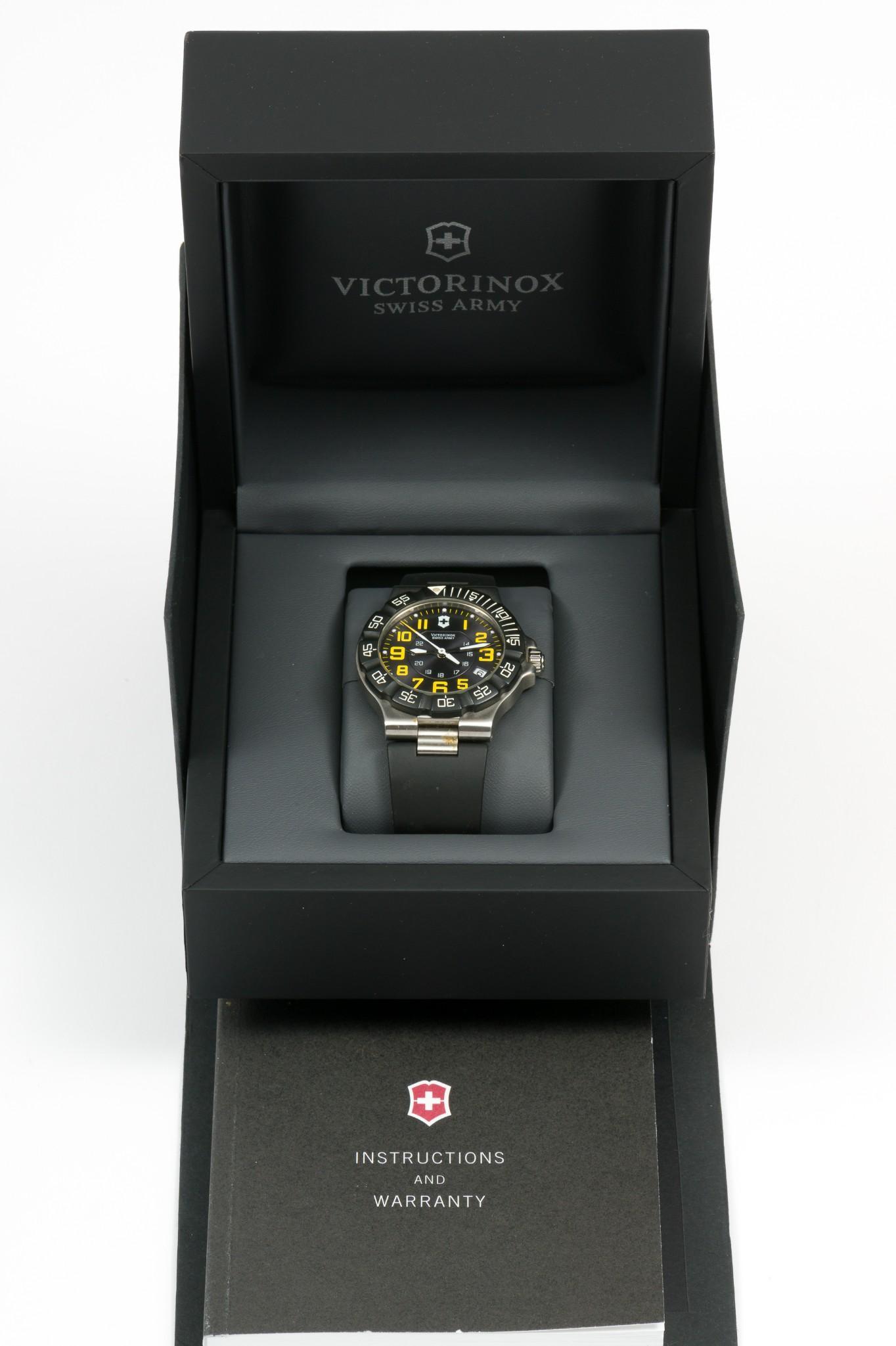 Victorinox Swiss Army Summitt XLT Wristwatch: Marked with 241412. Case length 1 and 5/8", lug to lug. LM IMPORTANT: Before bidding, please read the terms and conditions. When you registered for the auction you agreed to these terms and will be re