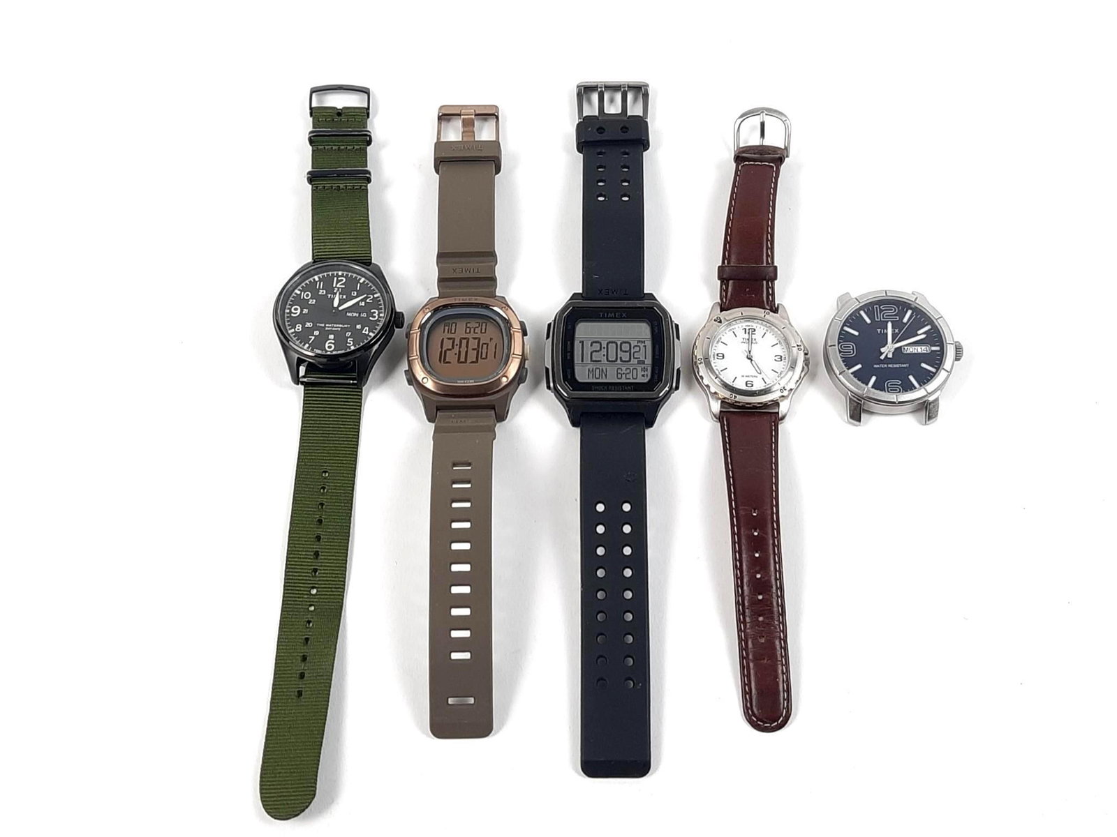 5 Timex Wristwatches: Leather banded watch starts and stops. All others working. LR IMPORTANT: Before bidding, please read the terms and conditions. When you registered for the auction you agreed to these terms and will be
