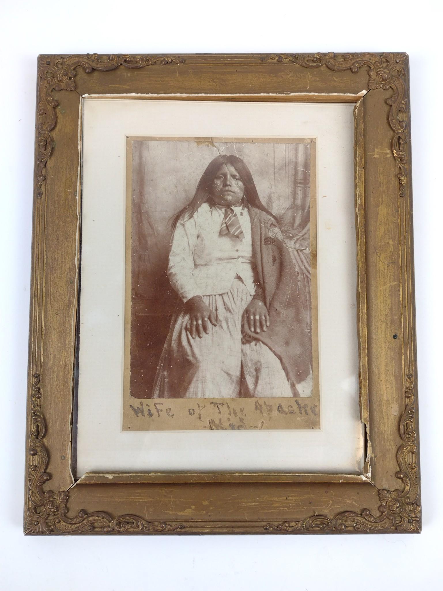 Photograph Of Wife Of Apache Kid: Affixed to mat with clear tape. Repaired tear upper right. 6" wide X 8" high. MG. IMPORTANT: Before bidding, please read the terms and conditions. When you registered for the auction you agreed to the