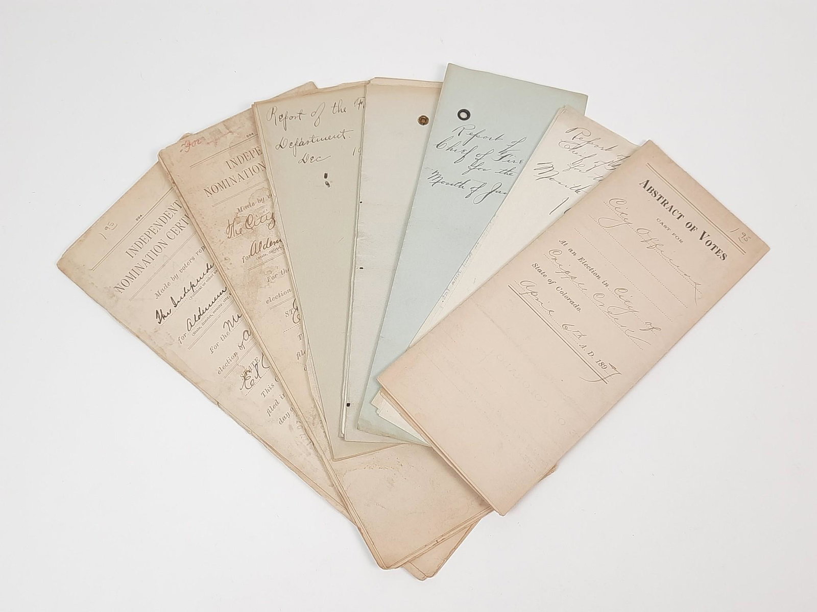 7 Documents Regarding Cripple Creek: Includes fire department reports, nomination certificate and abstract of votes. Some toning, creases and chipping. LR IMPORTANT: Before bidding, please read the terms and conditions. When you register