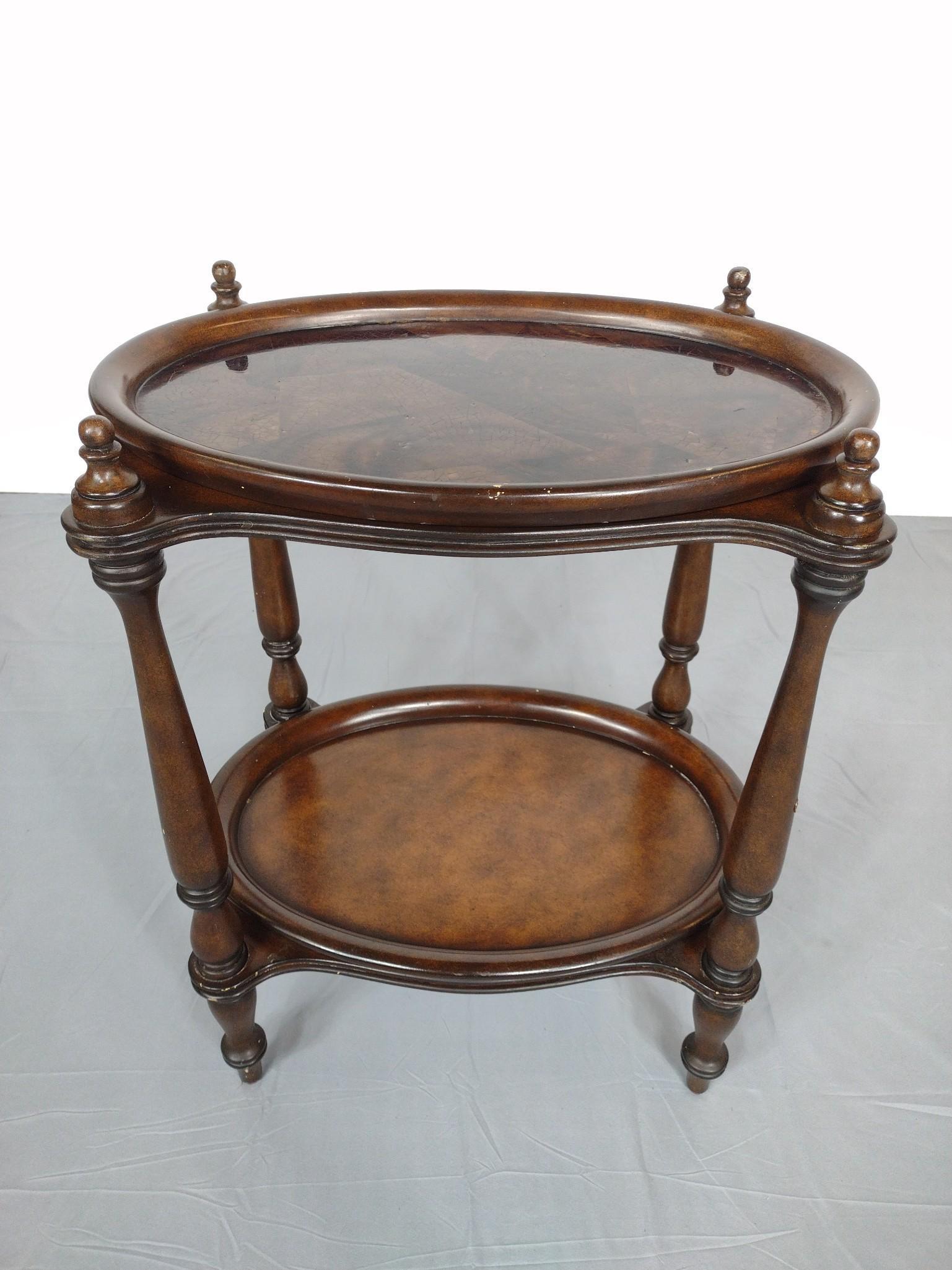 Tray Table: No makers markings. 22" wide X 15-1/2" deep X 28" high. Has scratches and finish loss. MG. IMPORTANT: Before bidding, please read the terms and conditions. When you registered for the auction you agre