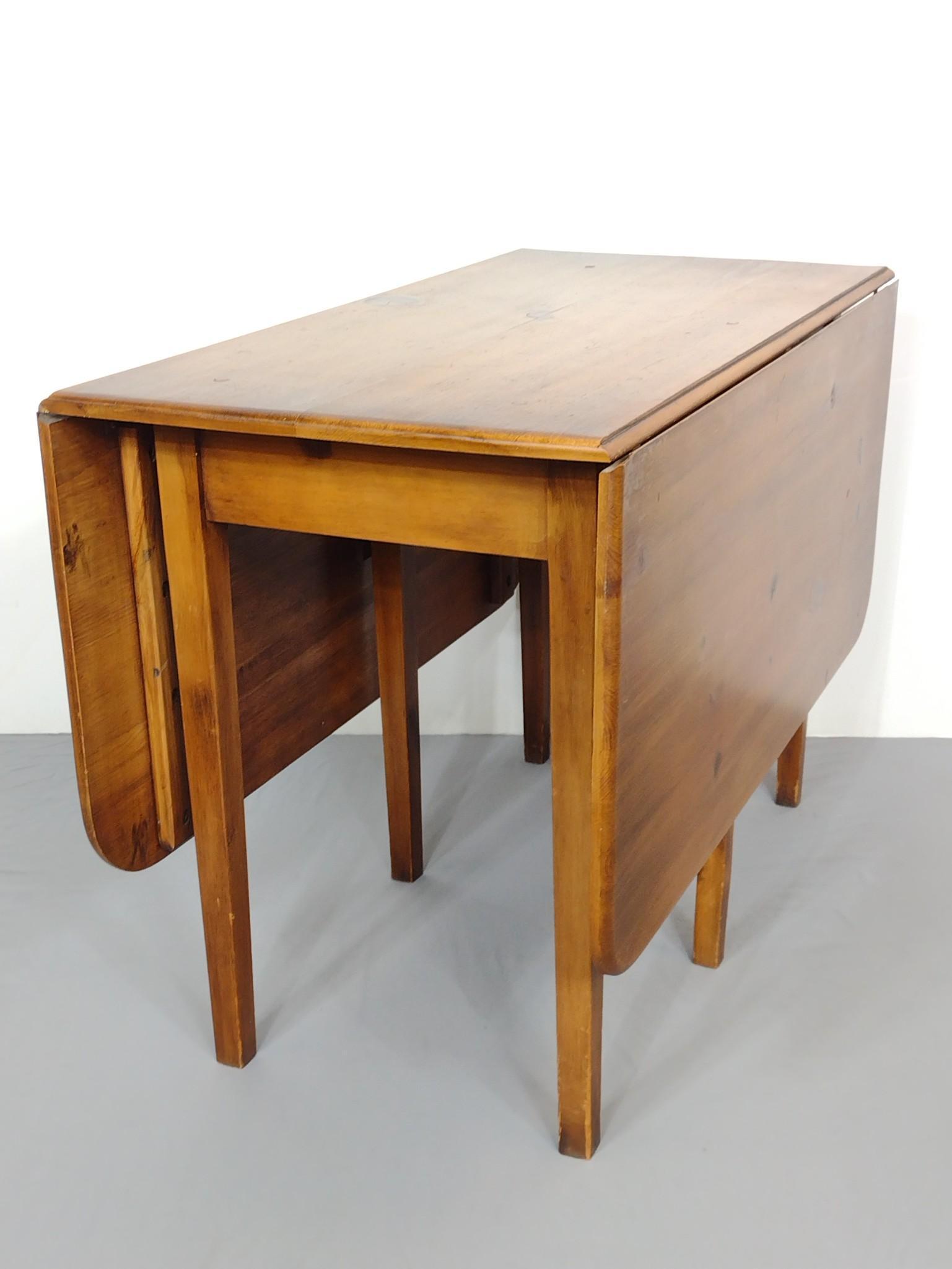 Drop Leaf Table: Open 60", closed 22-1/4" wide X 44" deep X 30" high. Has some scratches to top and legs. MG. IMPORTANT: Before bidding, please read the terms and conditions. When you registered for the auction you ag