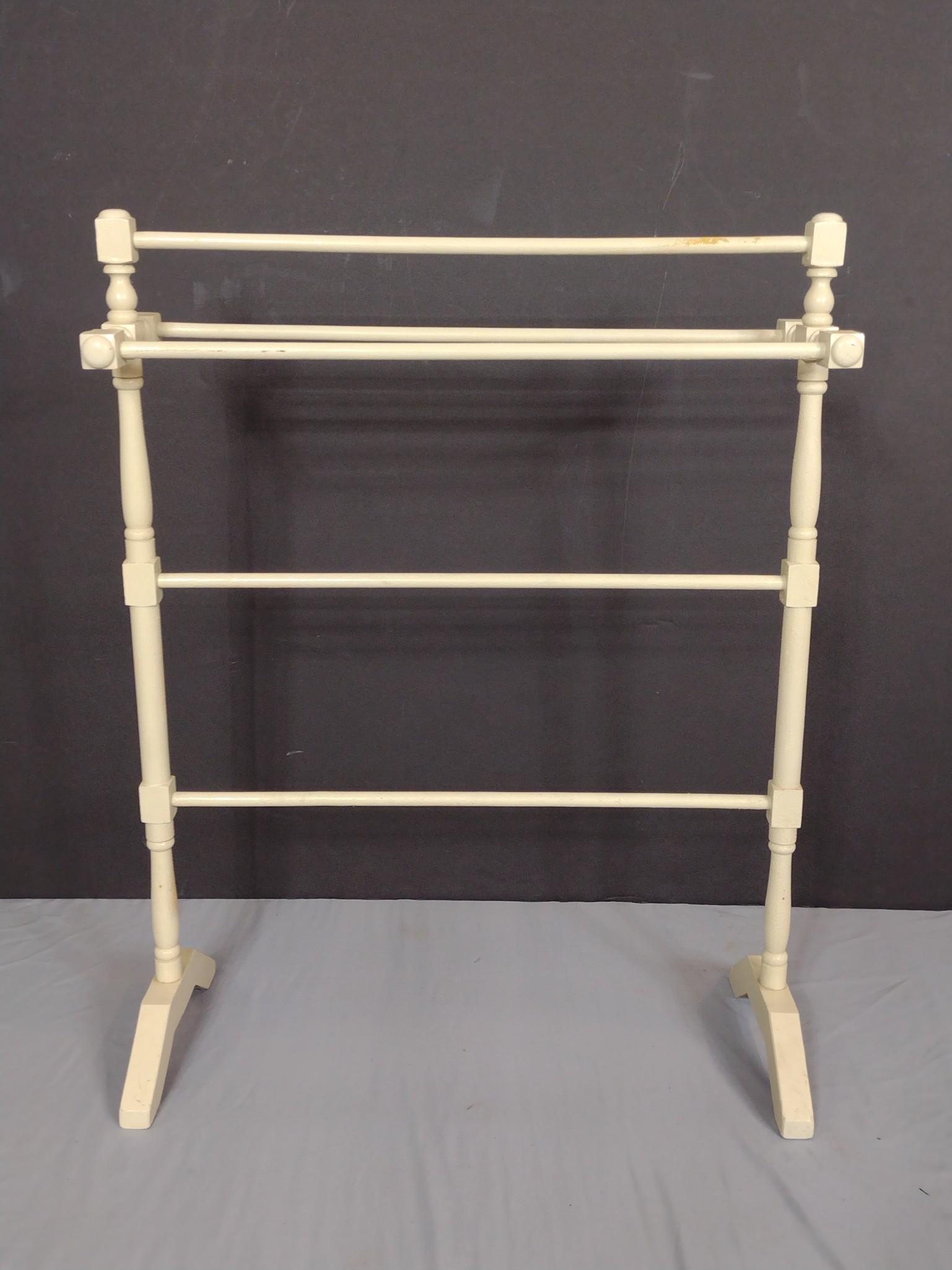 Quilt Rack: 24-1/2" wide X 11" deep X 31-1/4" high. Has some discoloring. MG. IMPORTANT: Before bidding, please read the terms and conditions. When you registered for the auction you agreed to these terms and wil