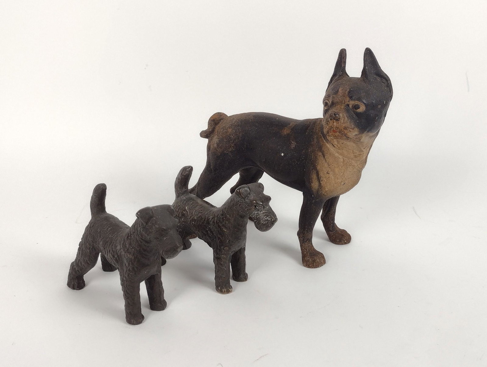 Boston Terrier Door Stop and Scotty Dog Bookends: Some finish losses. Measures 6" wide to 8-1/2" wide and 5-1/4" tall to 10-1/2" tall. MEG IMPORTANT: Before bidding, please read the terms and conditions. When you registered for the auction you agreed