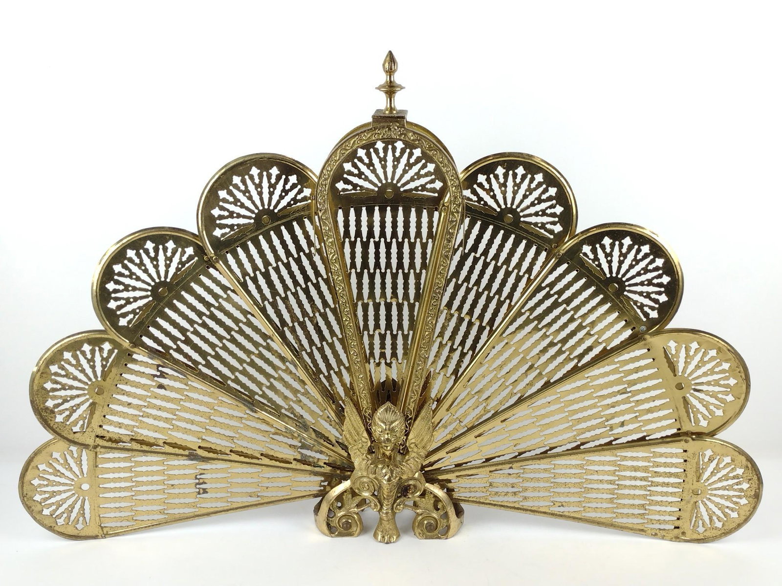 Brass Fire Screen: 23-3/4" high x 8" wide base. Closed 7". Open 38-1/2". DP. IMPORTANT: Before bidding, please read the terms and conditions. When you registered for the auction you agreed to these terms and will be req