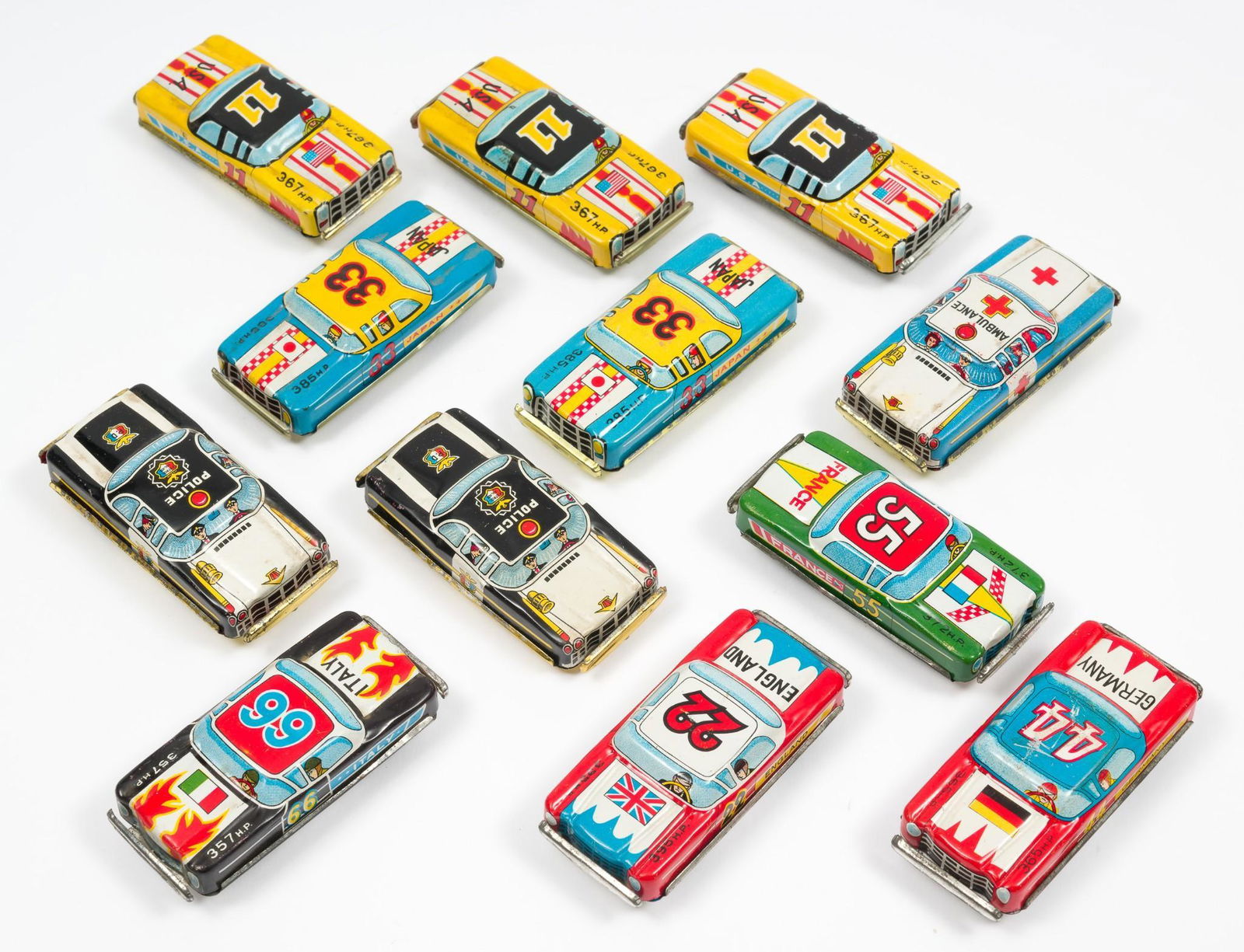 12 TN Toys Tin Litho Cars Incl Police: Includes Italy 66, Germany 44, France 55, England 22, two Japan 33, three U.S.A. 11, two Police, and Ambulance cars. All Made in Japan. RM IMPORTANT: Before bidding, please read the terms and conditio