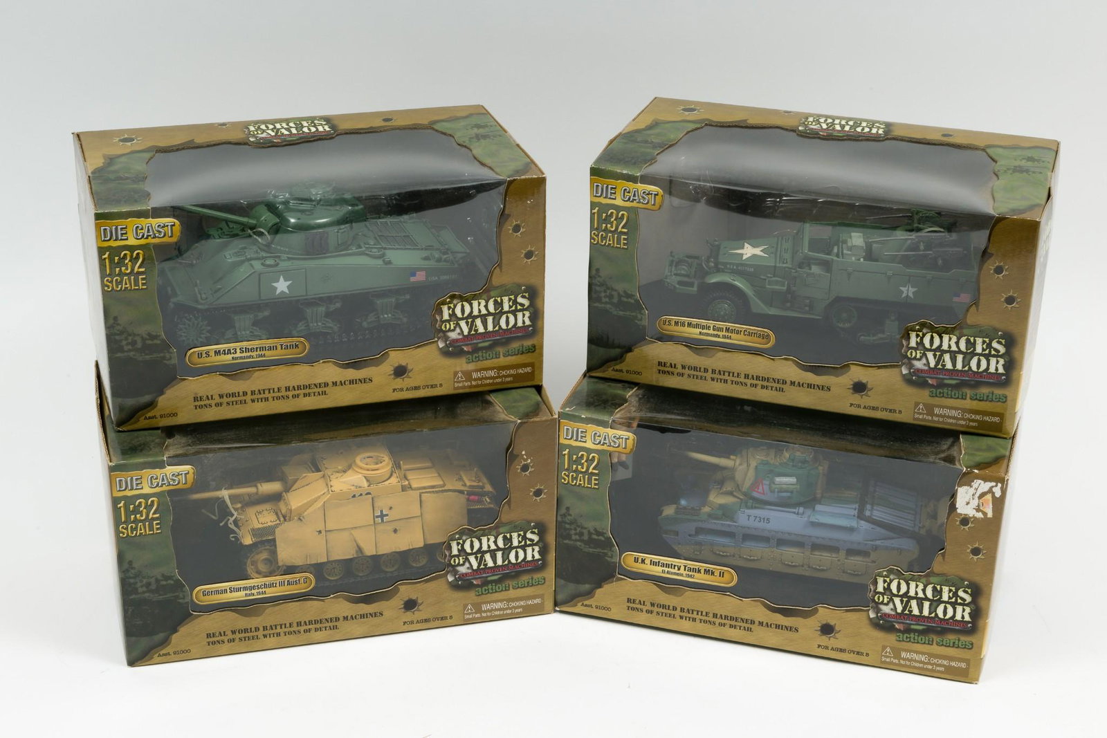4 Forces of Valor Action Series Die Cast 1:32 Vehicles: Includes U.S. M4A3 Sherman Tank Normandy, 1944, U.S. M16 Multiple Gun Motor Carriage Normandy, 1944, U.K. Infantry Tank Mk. II El-Alamein, 1942, and German Sturmegeschuts III Aust. G Italy 1944. All i
