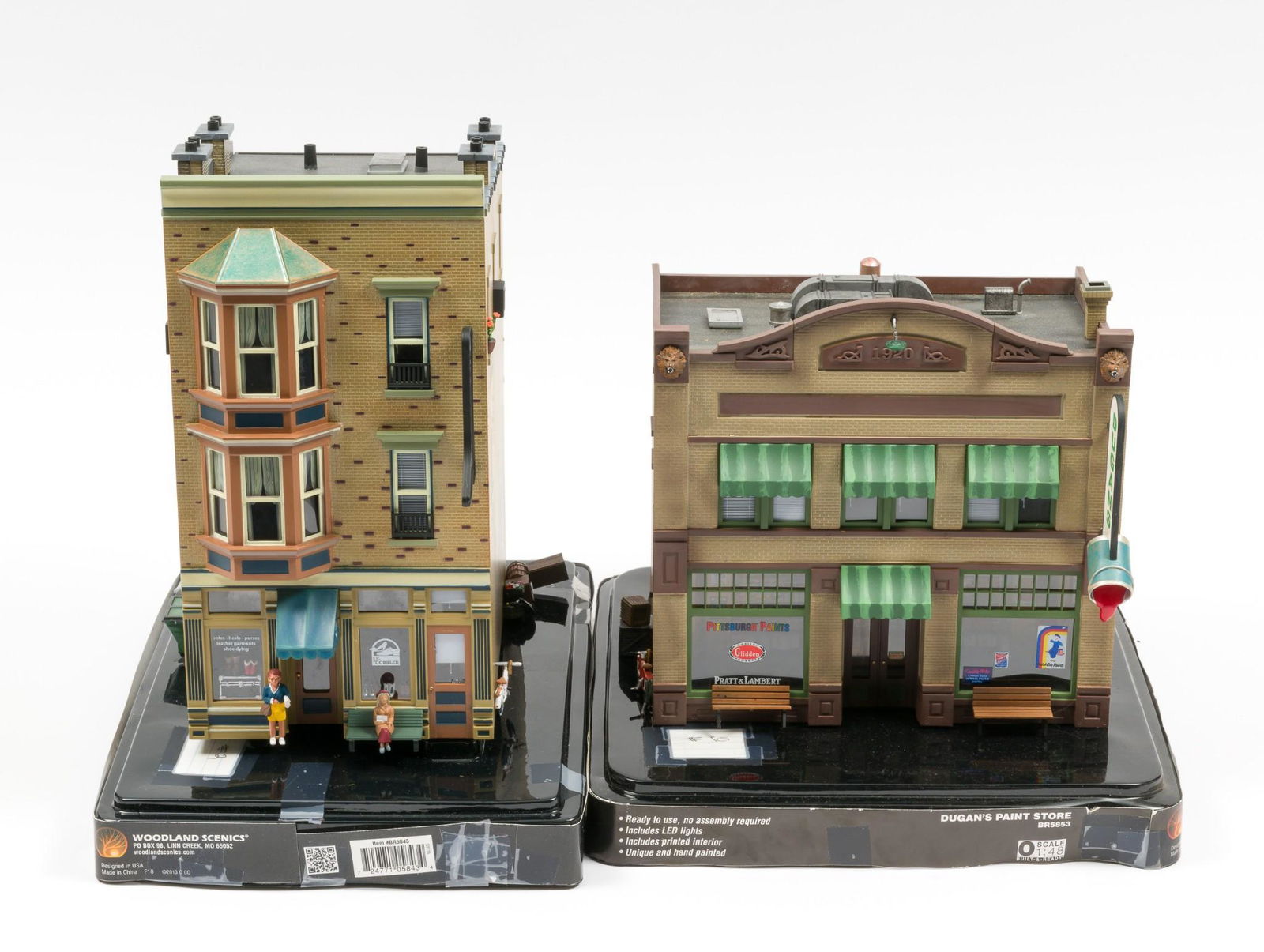 Woodland Scenics Landmark Structures Cobbler & Paint Store: Dugan's Paint Store BR 5853. J.W. Cobbler BR 5843. Bot displayed, with original packaging. Packaging with wear from storage. MH. IMPORTANT: Before bidding, please read the terms and conditions. When y