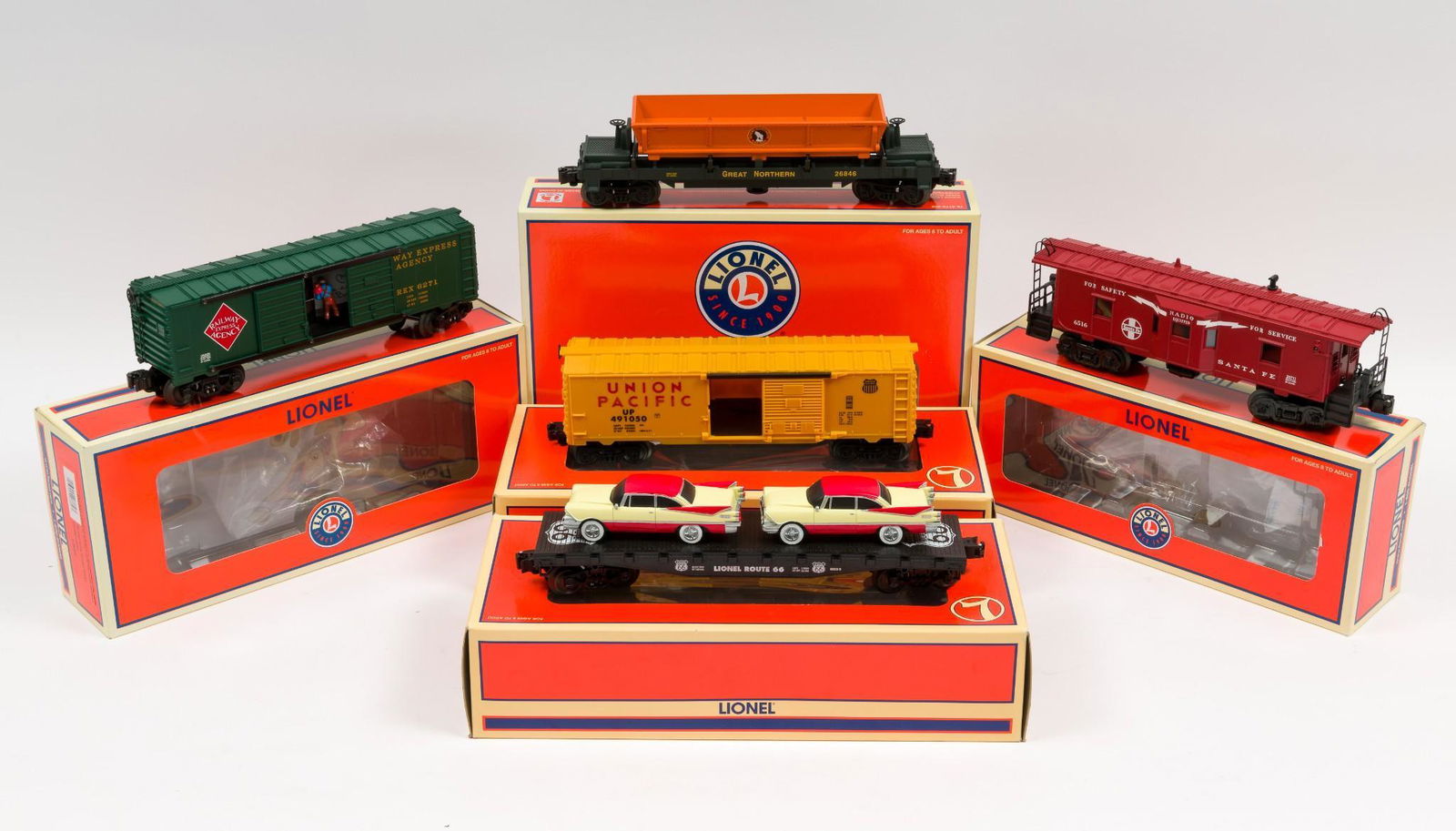 5 Lionel Freight Cars with OBs: Includes 29711 Archive Collection 6516 Santa Fe Bay Window Caboose 29711, Great Northern Coal Dump Car 26846, Railway Express Jumping Hobo Boxcar 26869, Route 66 Flat Car with Cream/red Luxury Coupes
