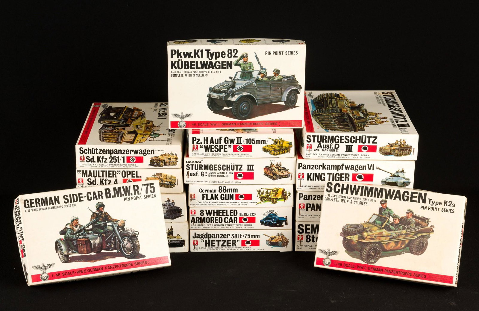 16 Bandai 1/48 Military Models: Sixteen Bandai 1/48 military models. Includes nos. 8223, 8237-150, 8227, 8240, 8241, 8228, 8235, 8221, 8236-300, 8239, 8267, 8225, 8224, 8226, 8222. All appear complete in original boxes. All with she