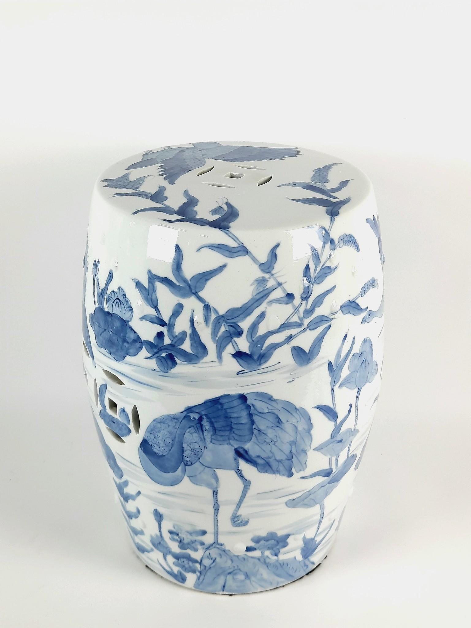Blue and White Ceramic Garden Seat with Cranes: No markings. 13-1/2" diameter x 18-1/2" high. LR IMPORTANT: Before bidding, please read the terms and conditions. When you registered for the auction you agreed to these terms and will be required to 