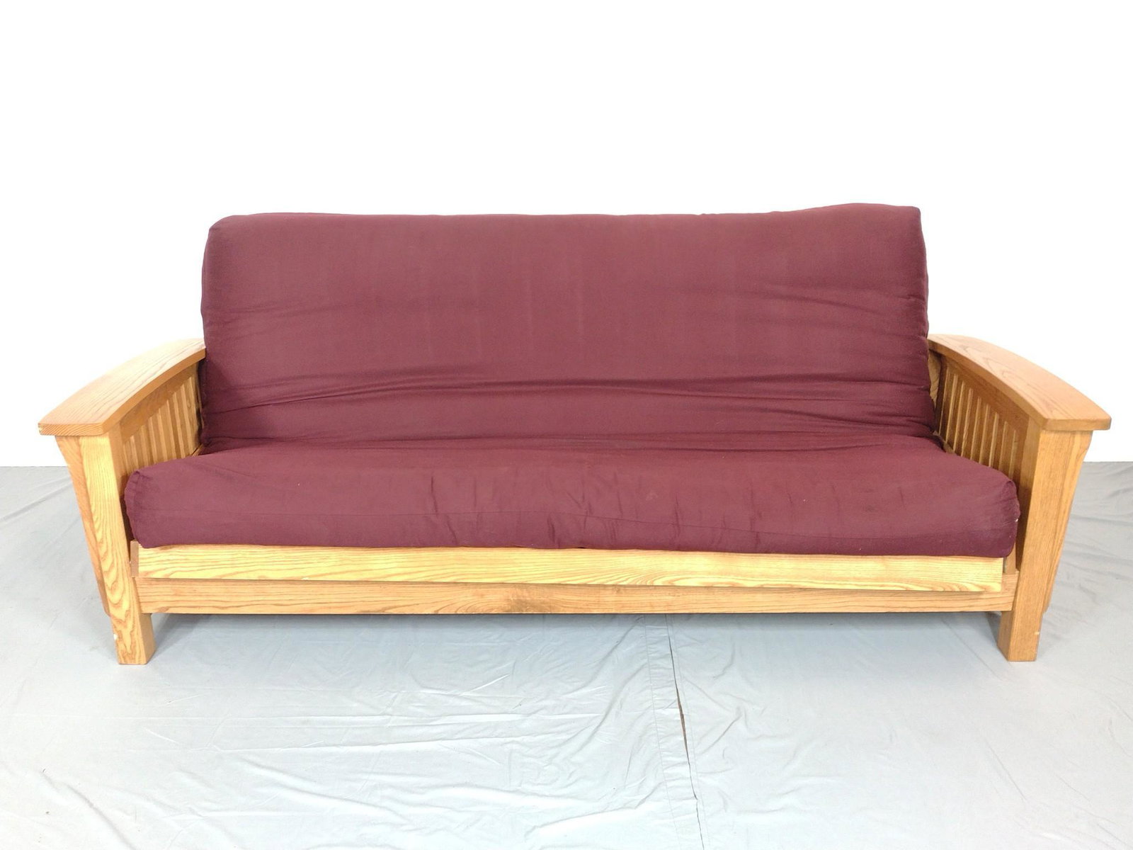 Wooden Frame Futon: 85-1/2" wide X 38" deep X 34" high. Cover has some spots of discoloring. Frame has some light scratches. MG. IMPORTANT: Before bidding, please read the terms and conditions. When you registered for th