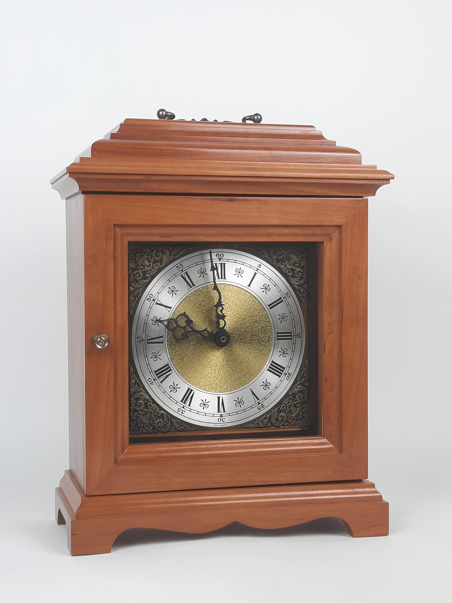 Mantel Clock: Starts and stops. Battery operated. Handcrafted by Harold L. Lesher. 11" wide x 5-1/2" deep x 15" high. Hands are loose. LR IMPORTANT: Before bidding, please read the terms and conditions. When you re