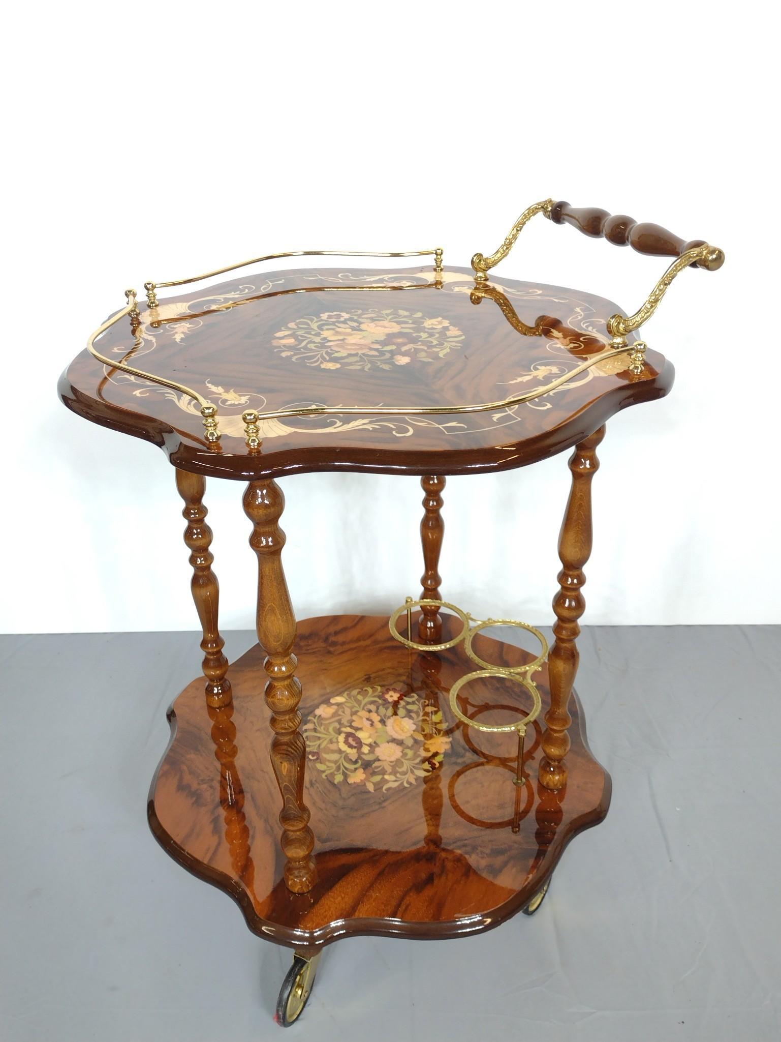 Inlaid Tea Cart: 22" wide X 22" deep X 30" high. Has some light scratches. MG. IMPORTANT: Before bidding, please read the terms and conditions. When you registered for the auction you agreed to these terms and will be