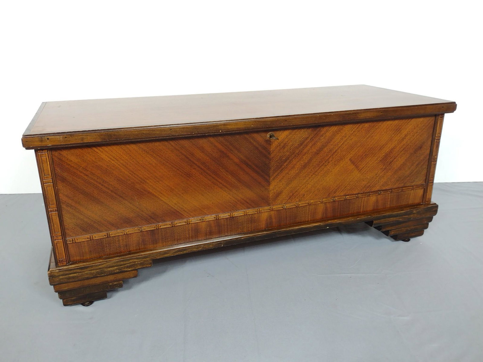 Cedar Chest: 45" wide X 18" deep X 17-1/2" high. Has a few scratches. MG. IMPORTANT: Before bidding, please read the terms and conditions. When you registered for the auction you agreed to these terms and will be 
