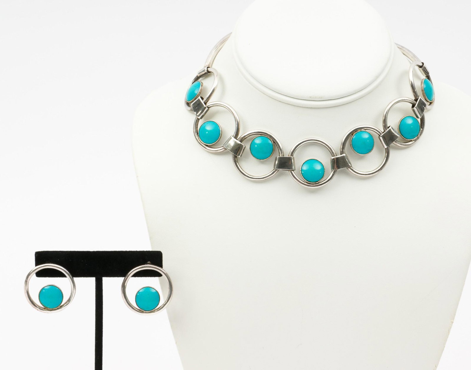 Mexican Silver & Turquoise Necklace and Earrings: Marked Mexico 970. Necklace 16" long. Earrings 1" diameter. MH IMPORTANT: Before bidding, please read the terms and conditions. When you registered for the auction you agreed to these terms and will b