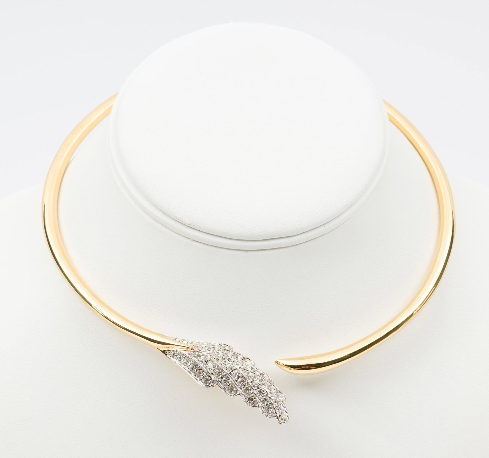 Roz Kaplan Rhinestone Choker: Hinged. 4-7/8" diameter. 3/4" at widest point. MH. IMPORTANT: Before bidding, please read the terms and conditions. When you registered for the auction you agreed to these terms and will be required t