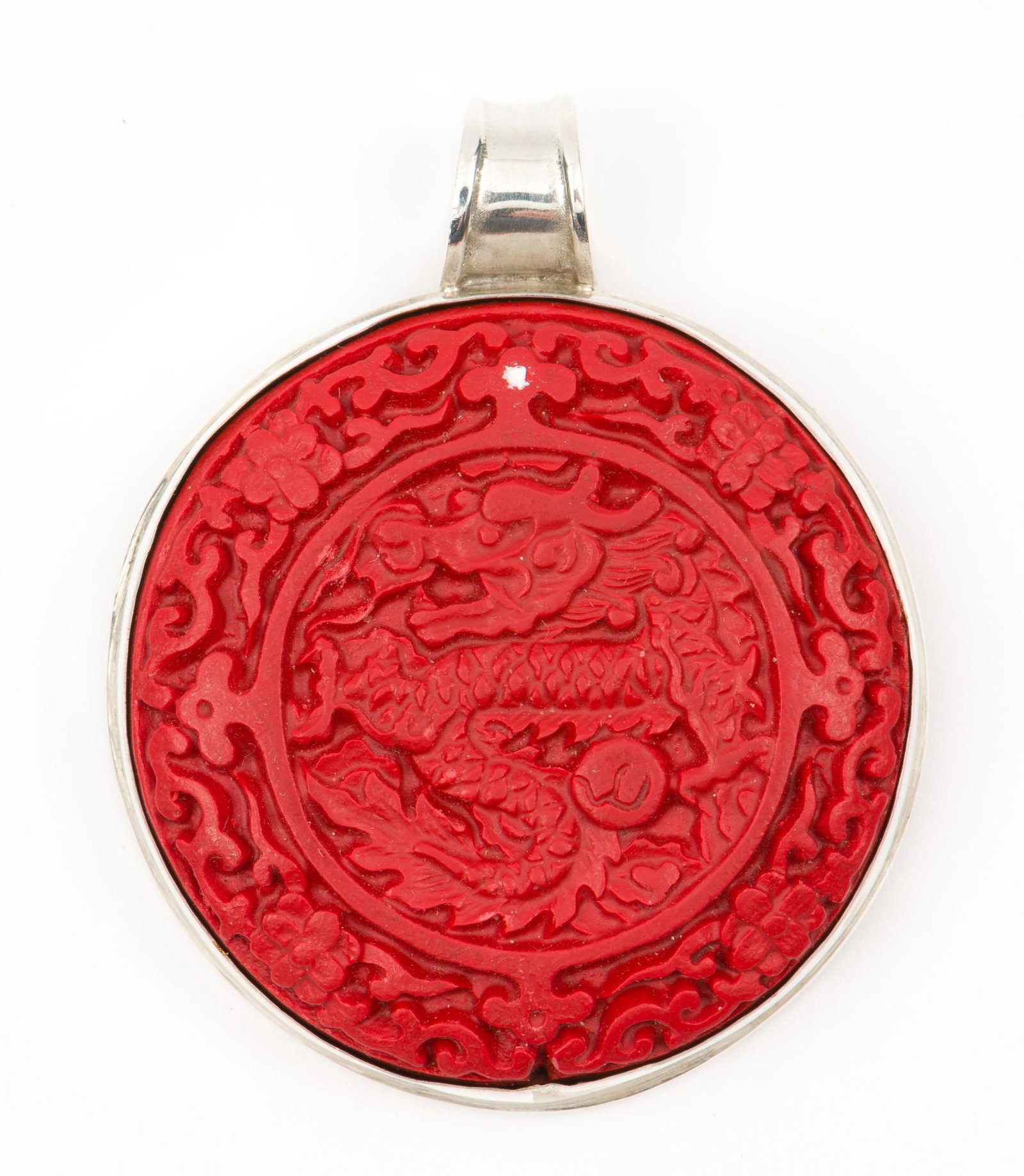 2 Inch Sterling Cinnabar Pendant: Marked 925. 2" diameter, 2-1/2" long with bail. MH. IMPORTANT: Before bidding, please read the terms and conditions. When you registered for the auction you agreed to these terms and will be required 