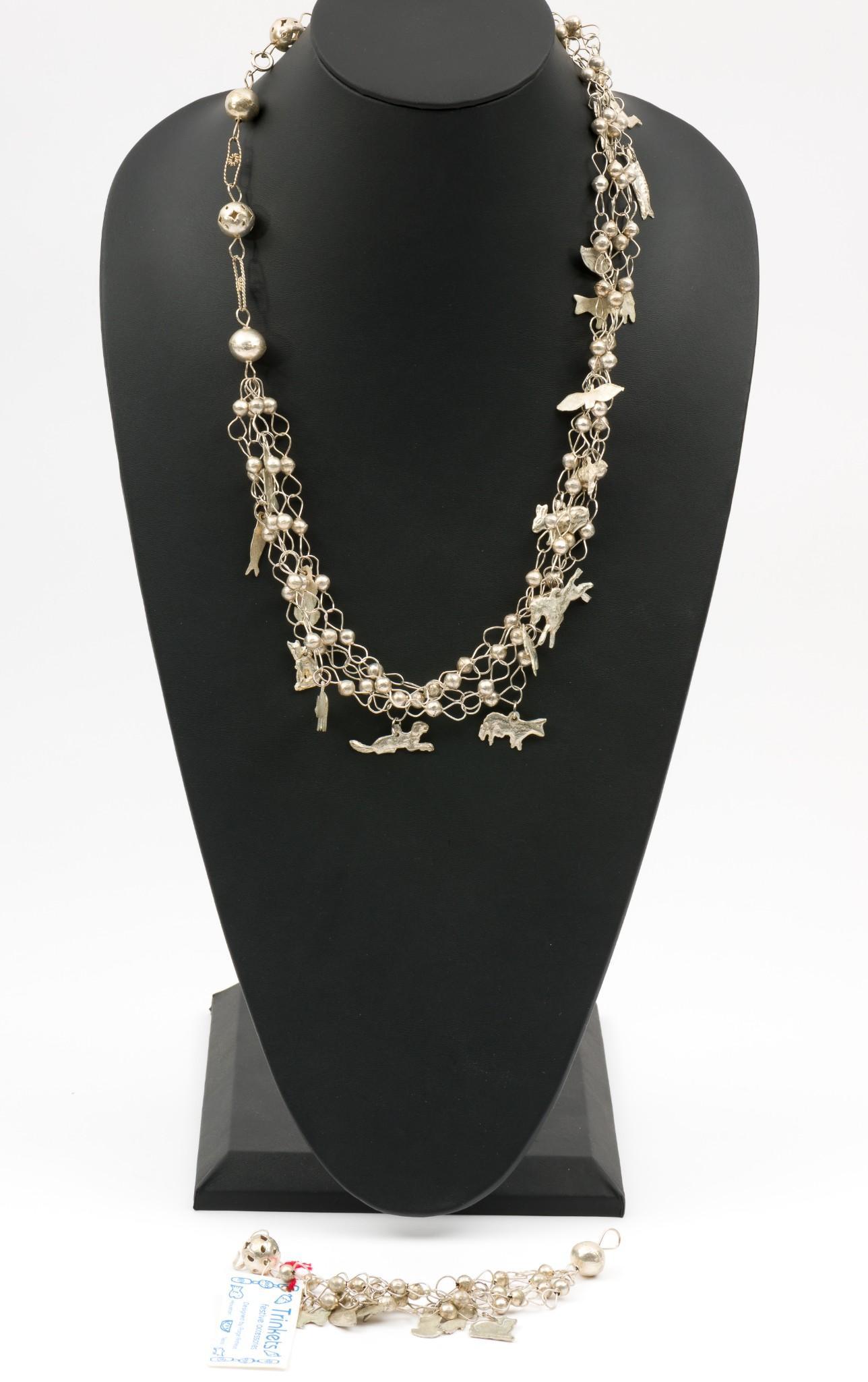Milagros Wedding Chain Necklace & Bracelet by Paige Andrews: Silver overlay chains with various milagros charms. By Trinkets by Paige Andrews, Houston Texas. Bracelet 6" long, necklace 26" long. IMPORTANT: Before bidding, please read the terms and conditions. W