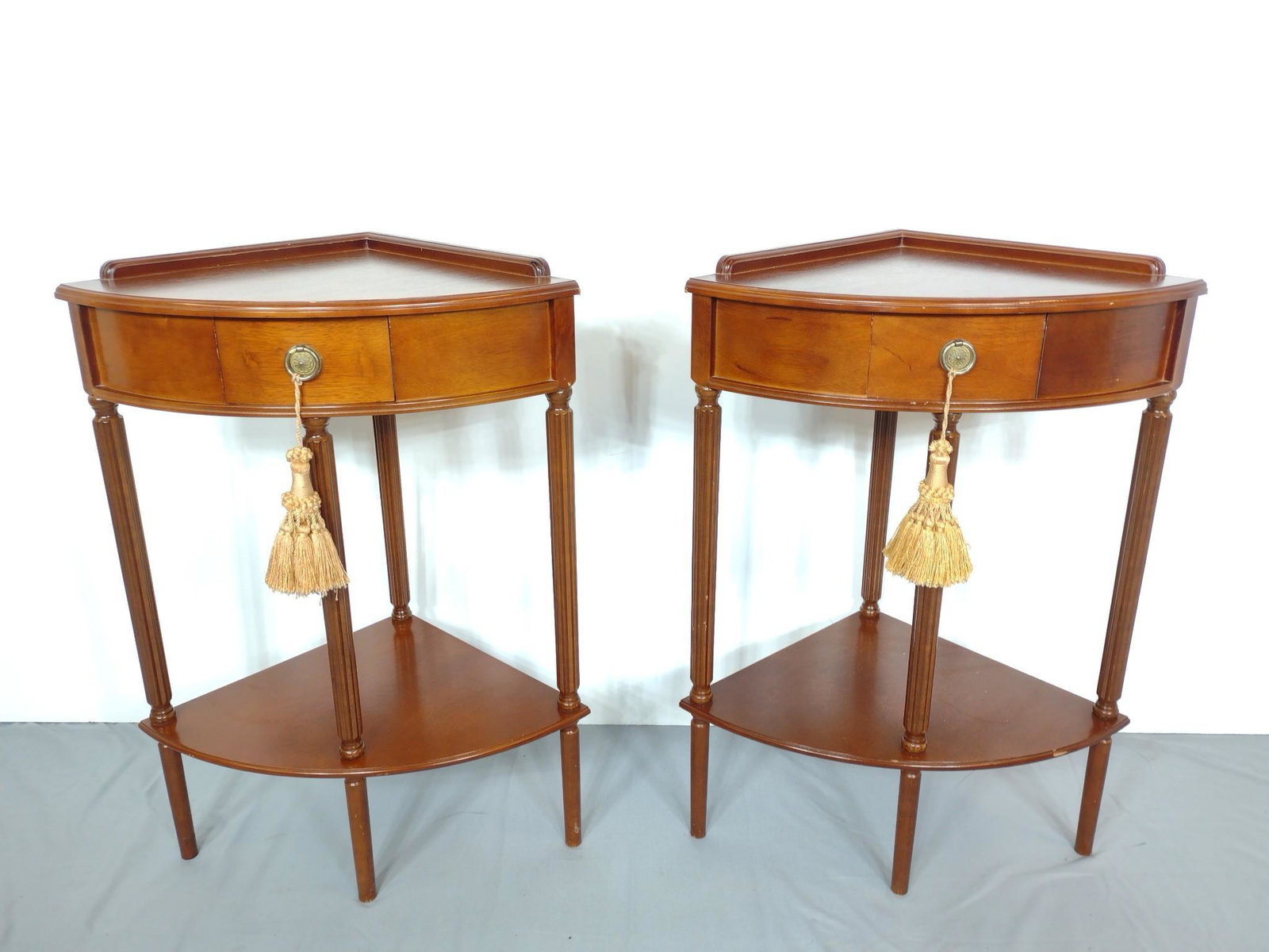 Pair of Corner End Tables: 16" wide X 16" deep X 30-1/2" high. Both have some light scratches. No manufactures name found. MG. IMPORTANT: Before bidding, please read the terms and conditions. When you registered for the auction