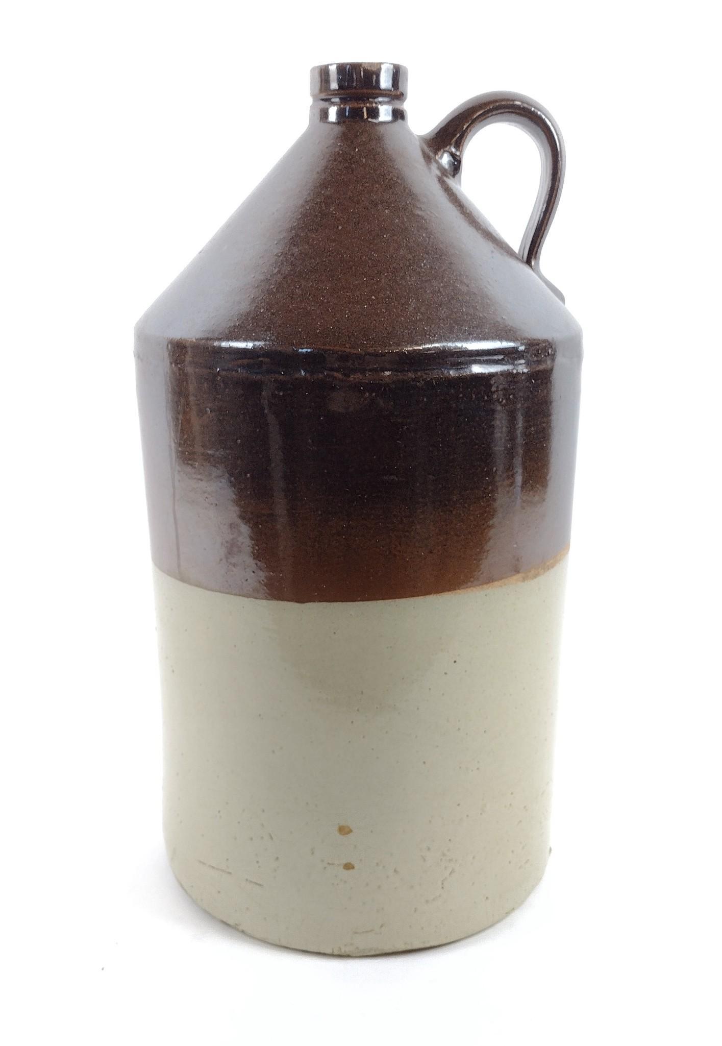 5 Gallon York Keystone Stoneware Jug: 12" diameter x 18-1/2" high. MEG IMPORTANT: Before bidding, please read the terms and conditions. When you registered for the auction you agreed to these terms and will be required to comply with them