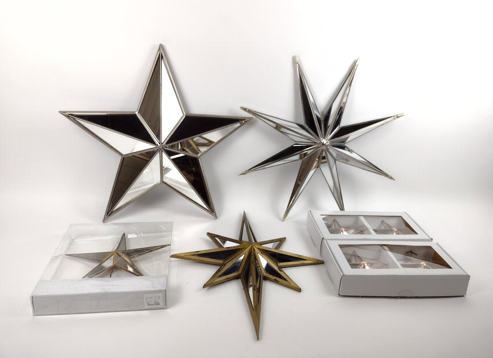 8 Mirrored Stars incl Tree Topper: 6 to 24-1/2" wide X 6" to 24-1/2" high. MEG IMPORTANT: Before bidding, please read the terms and conditions. When you registered for the auction you agreed to these terms and will be required to compl