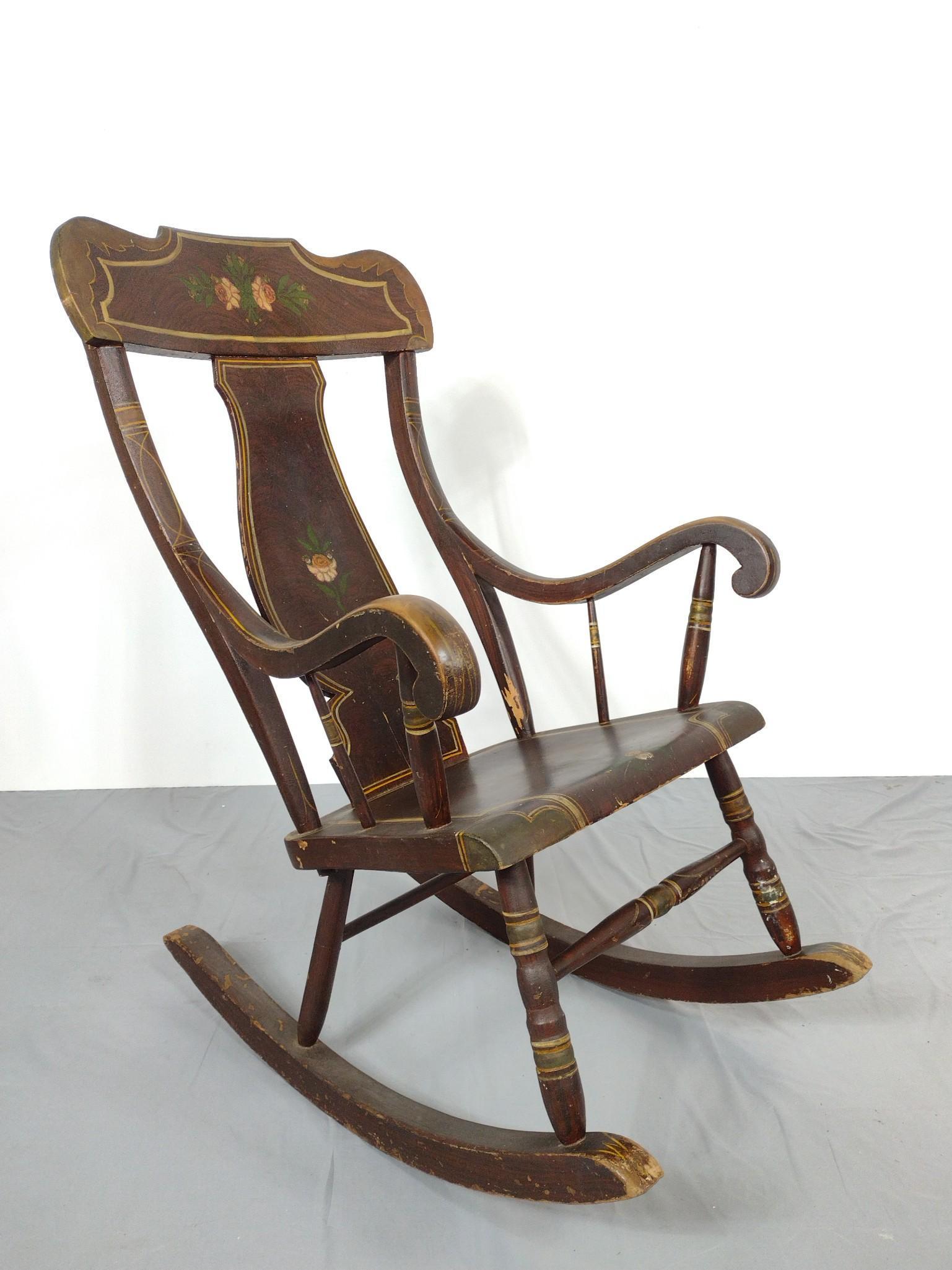 Stenciled Rocking Chair: 24" wide X 34" deep X 42" high. Has scratches and paint loss. MG. IMPORTANT: Before bidding, please read the terms and conditions. When you registered for the auction you agreed to these terms and wil