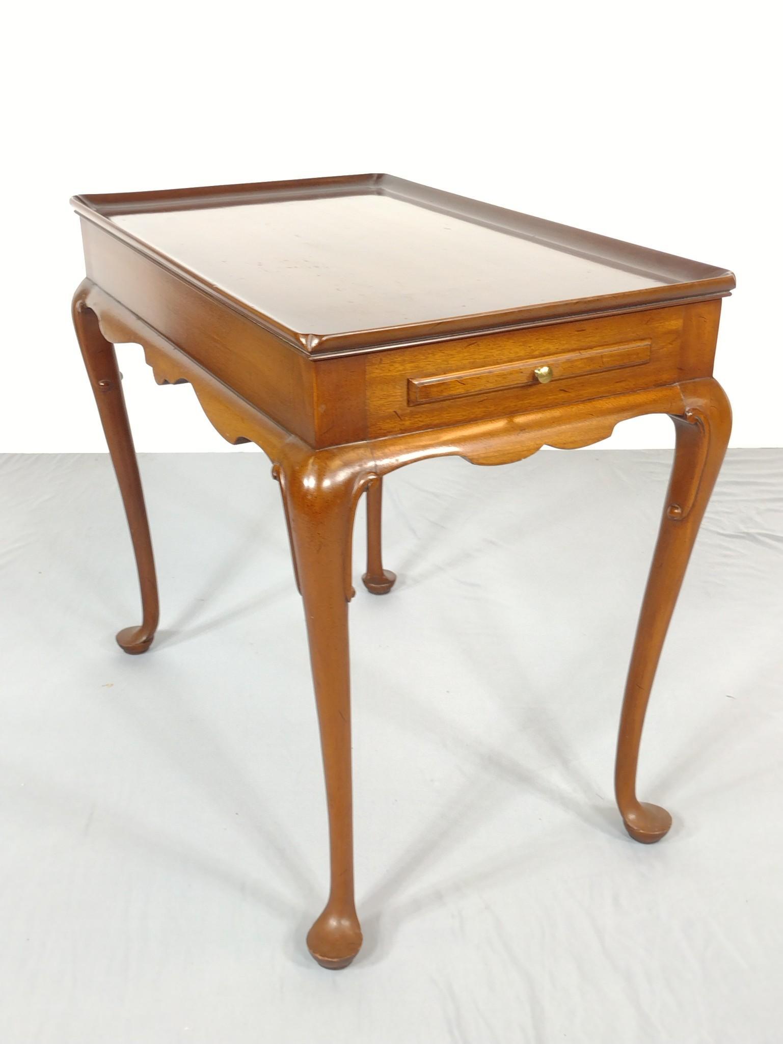 Chippendale Style Tea Table: 18" wide X 29-1/2" deep X 26-1/2" high. Has some light scratches. No manufactures name found. MG. IMPORTANT: Before bidding, please read the terms and conditions. When you registered for the auction y